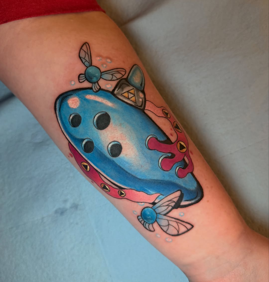 Omni-harp new school tattoo on the forearm by Colton🎨