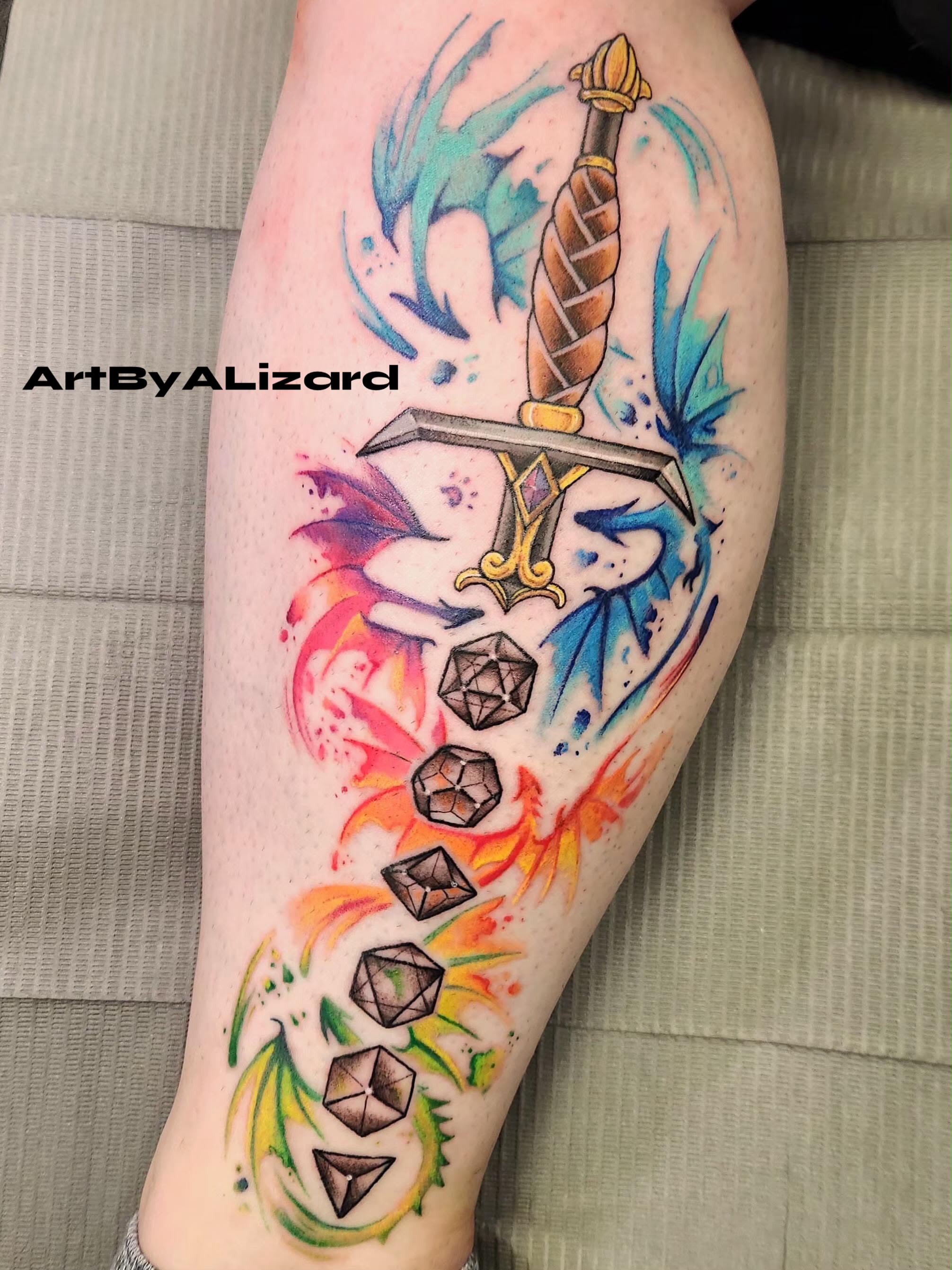 Tattoo by @artbyalizard — watercolor, geometric