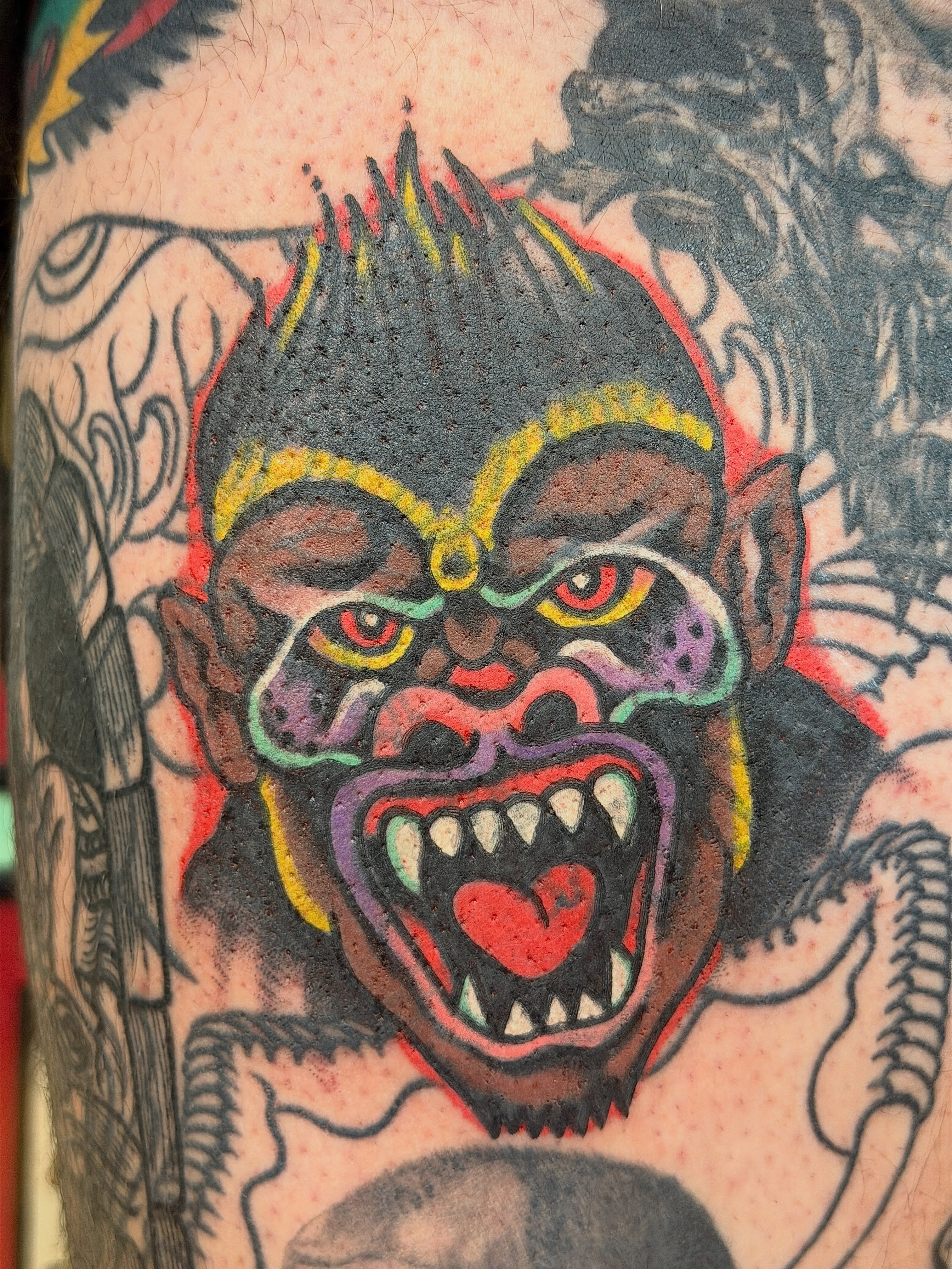 Angry gorilla American traditional tattoo on the forearm by Joshua Speight