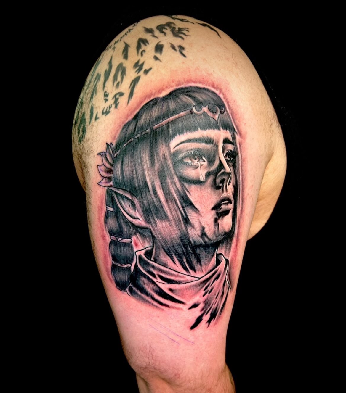 Elf-like woman realism tattoo on the shoulder by Austin Young