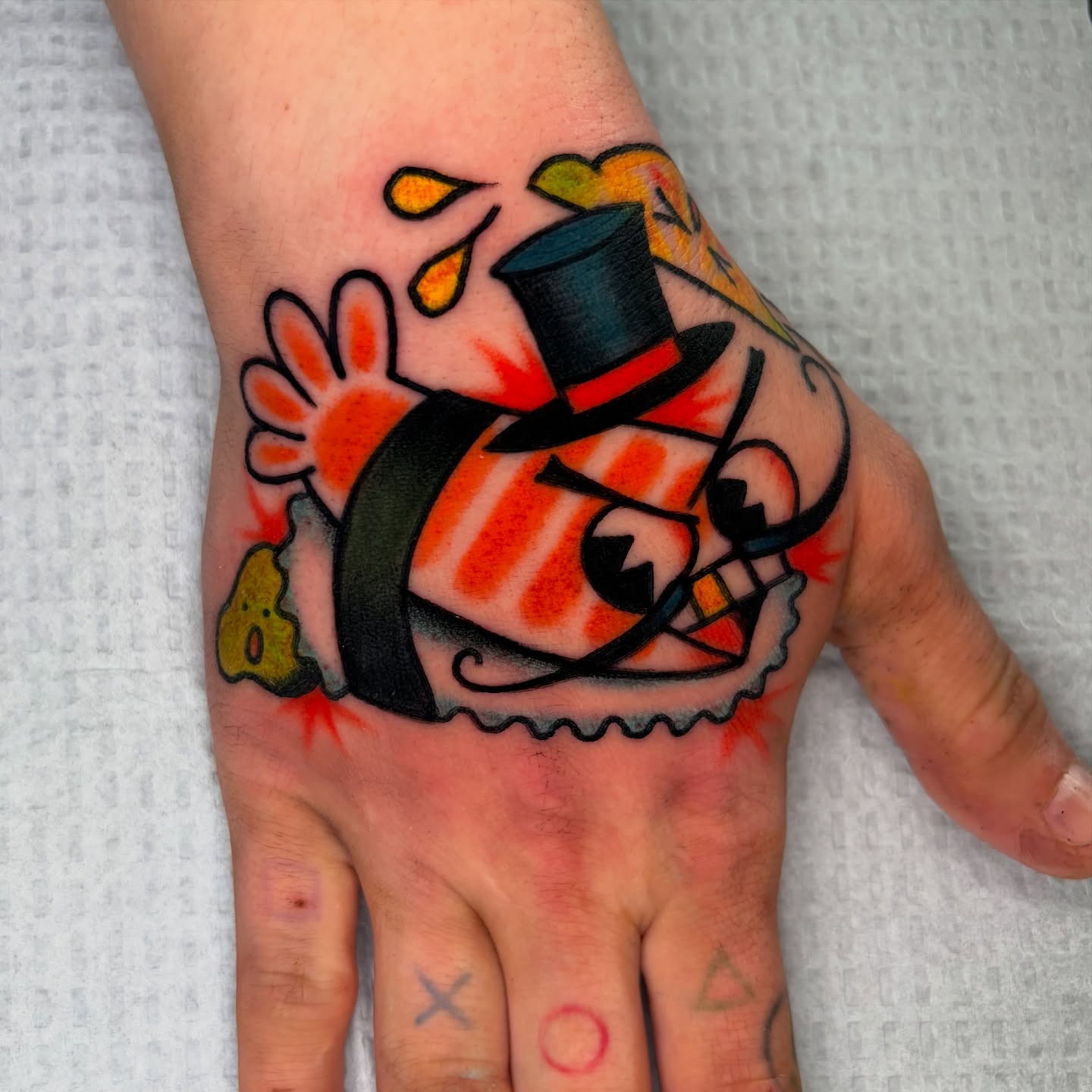 Clownfish American traditional tattoo on the hand by 🌴Nick Hetzel🌴, Saint Petersburg, Florida