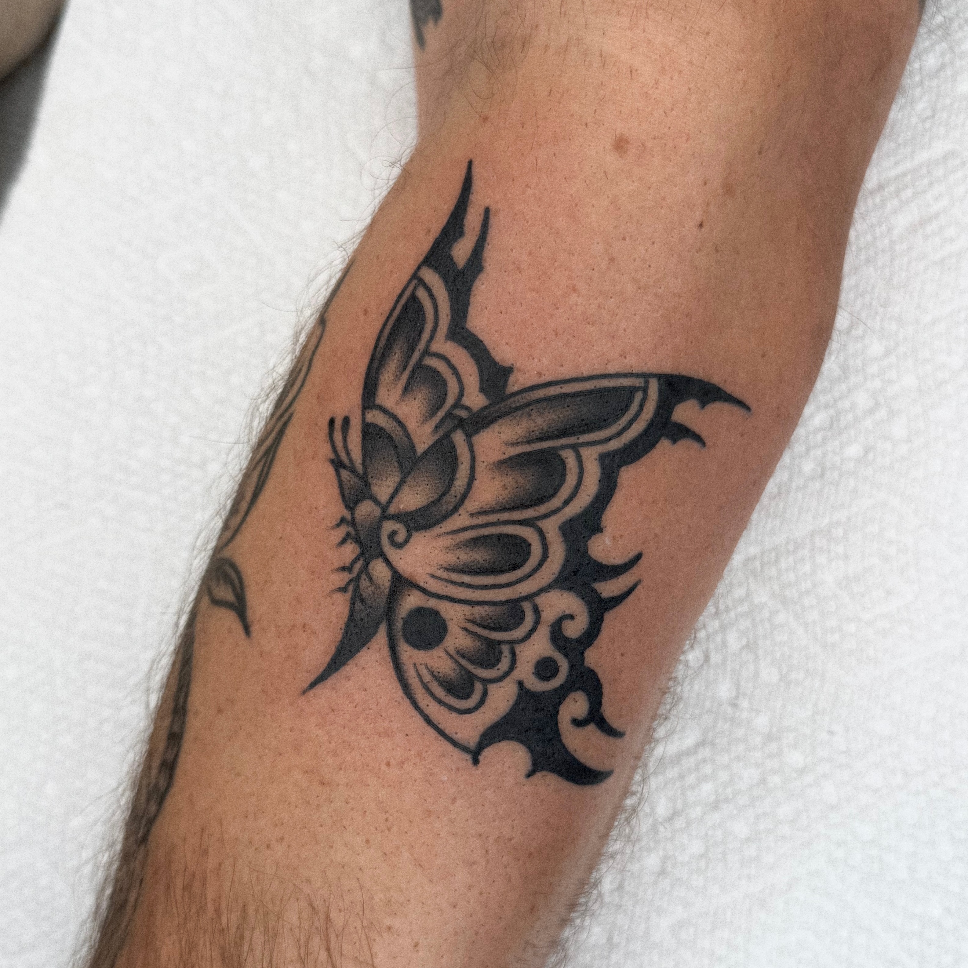 Tattoo by @baby__ugly — black_and_grey, tribal