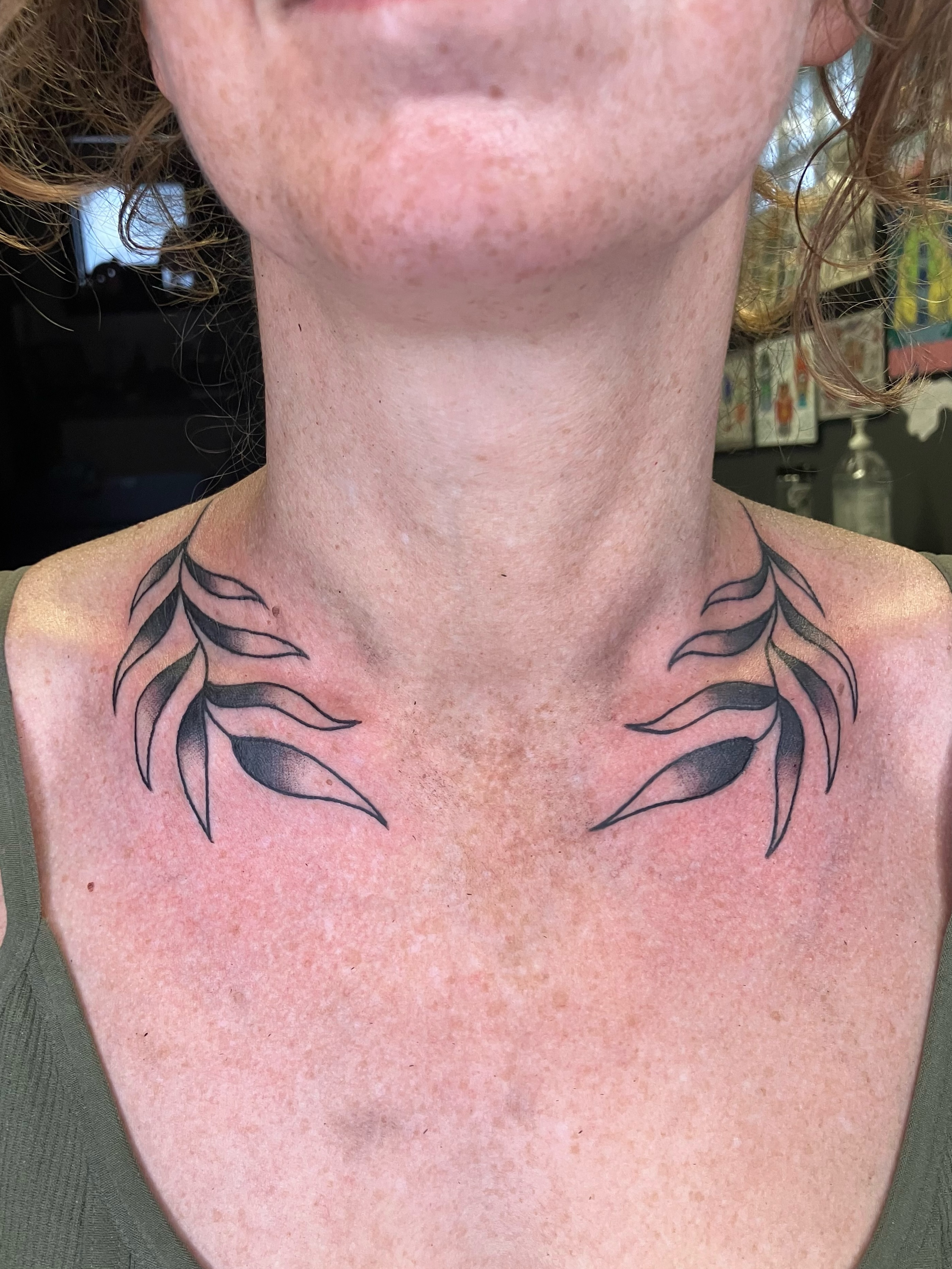 Feather black and grey tattoo on the chest by maddie mcghee, Memphis, Tennessee