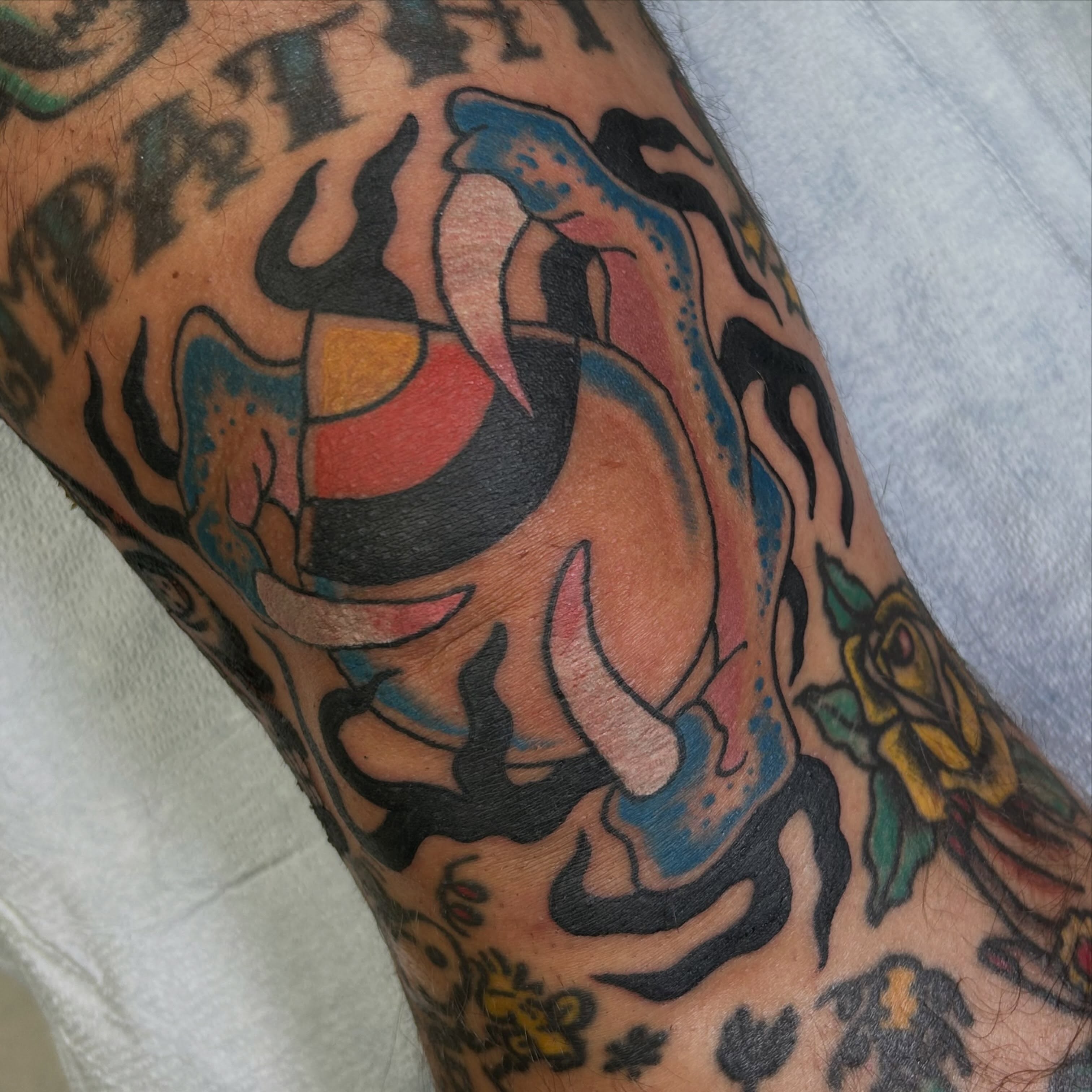 Abstract design American traditional tattoo on the forearm by Erin Einhorn