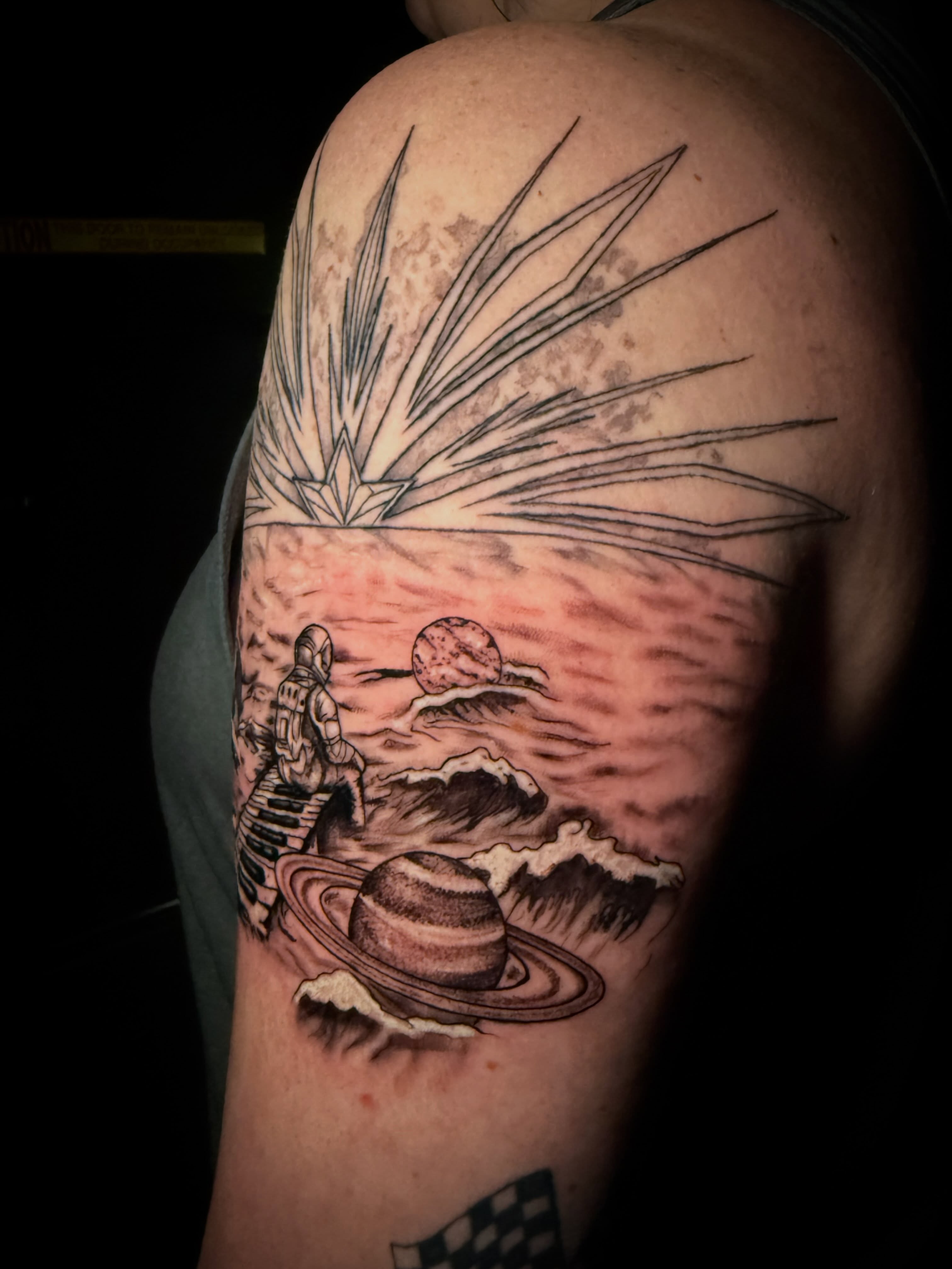 Astronaut and Saturn realism tattoo on the shoulder by π΅ππππππ¦π€