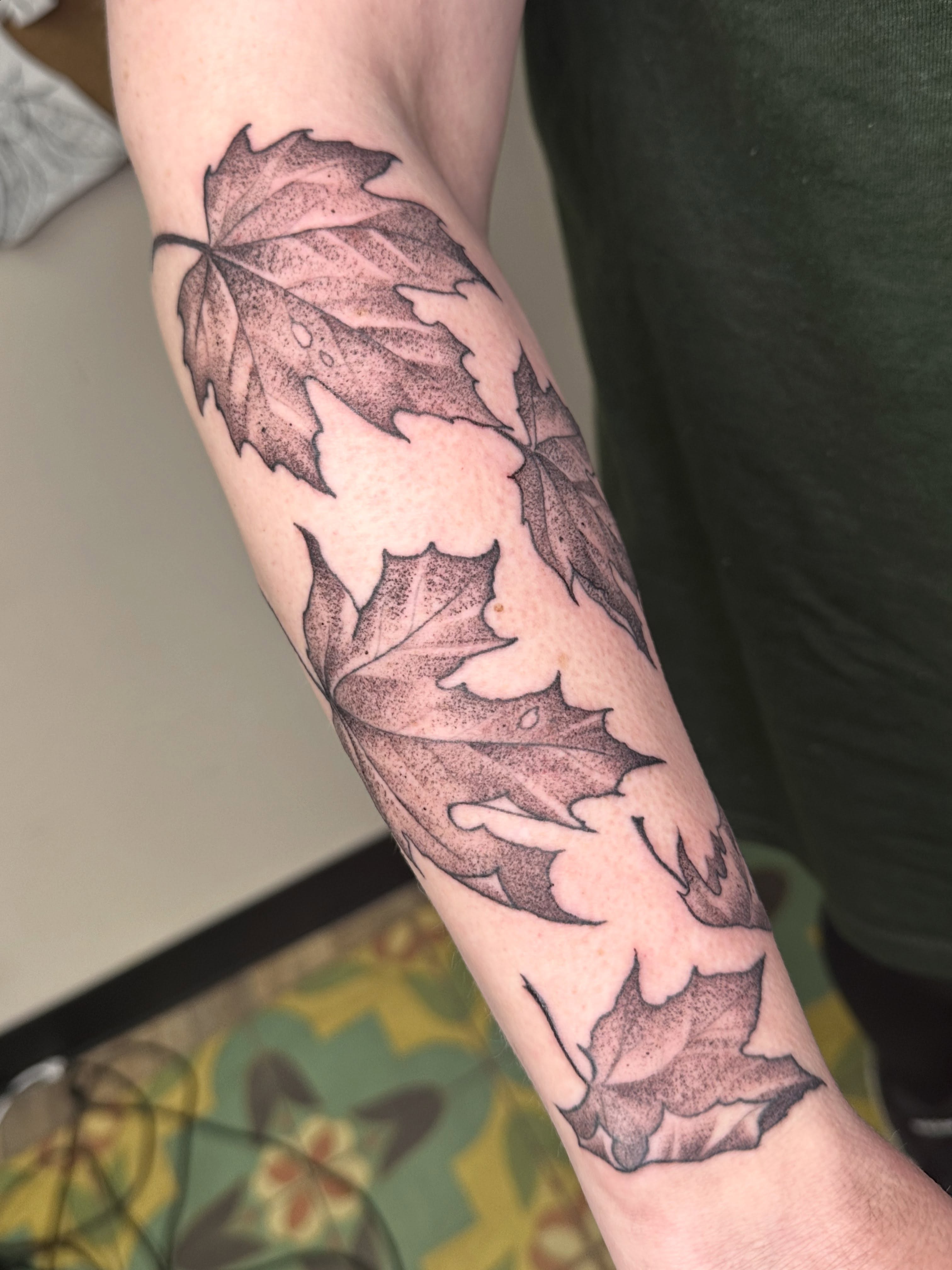 Maple leaves dotwork tattoo on the forearm by Heather Tattoos Danvers MA
