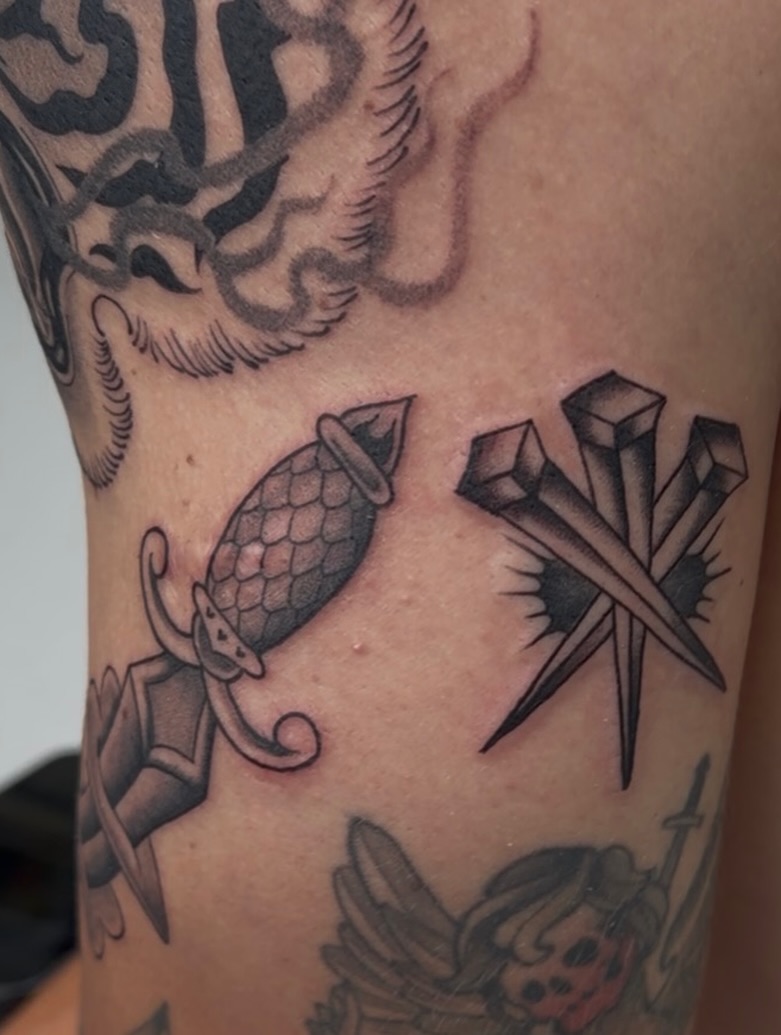 Pineapple grenade black and grey tattoo on the forearm by 𝕸𝖔𝖓𝖎𝖖𝖚𝖊𝖊𝖓