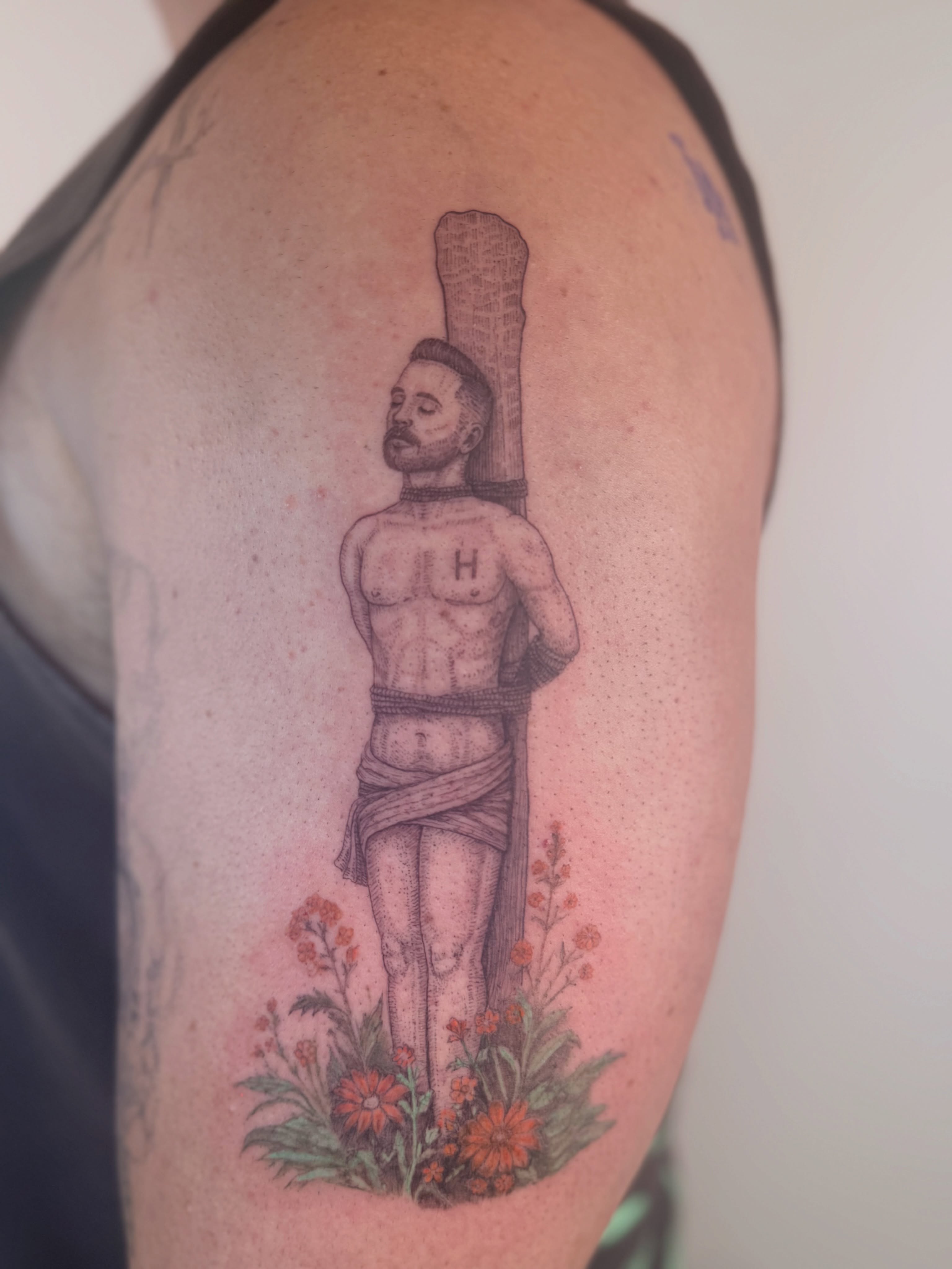 Man with tree trunk realism tattoo on the shoulder by Yuri Chloe Ngo Tattoo Artist