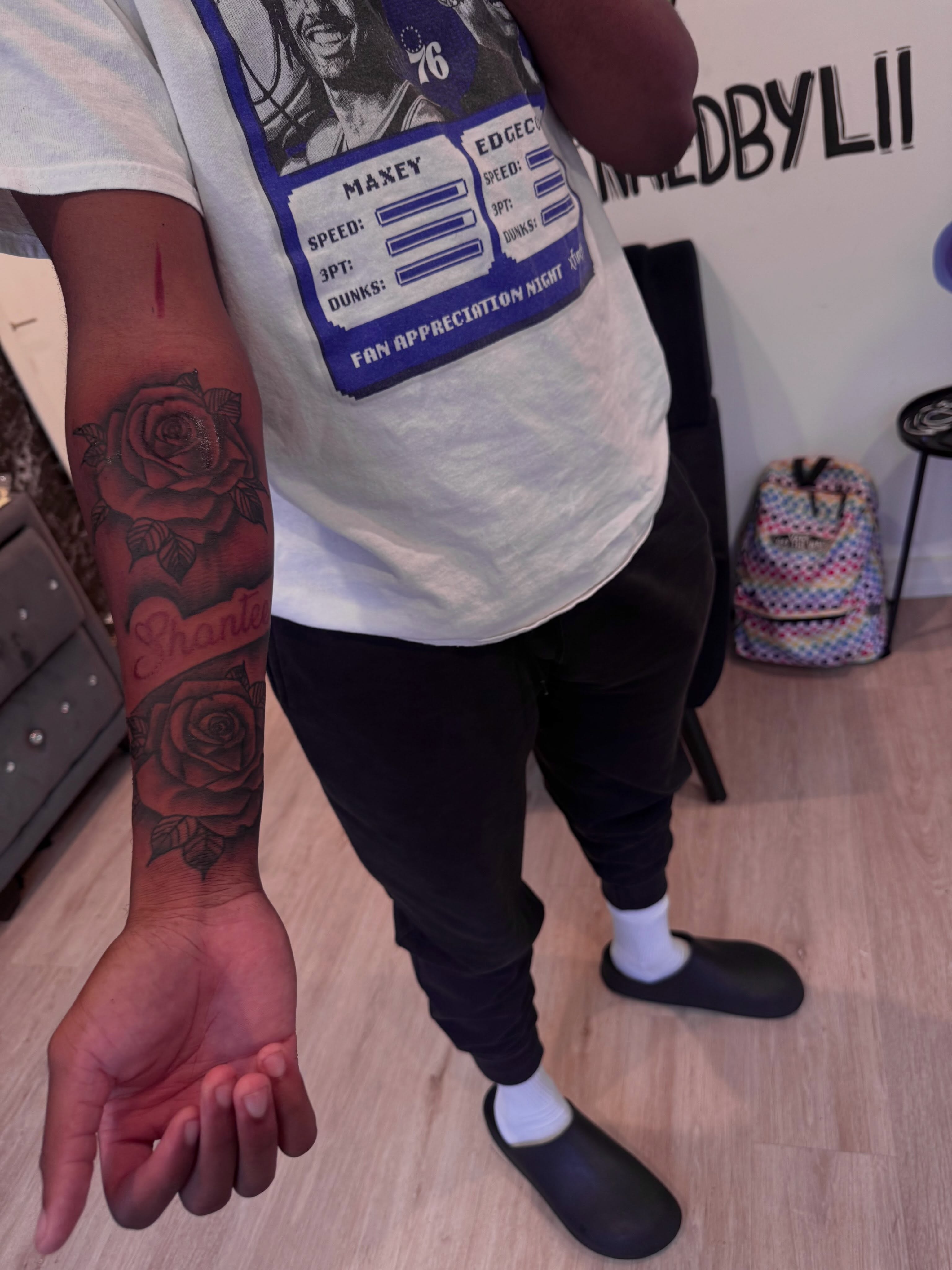 Rose black and grey tattoo on the forearm by inkedbylii, Philadelphia, Pennsylvania