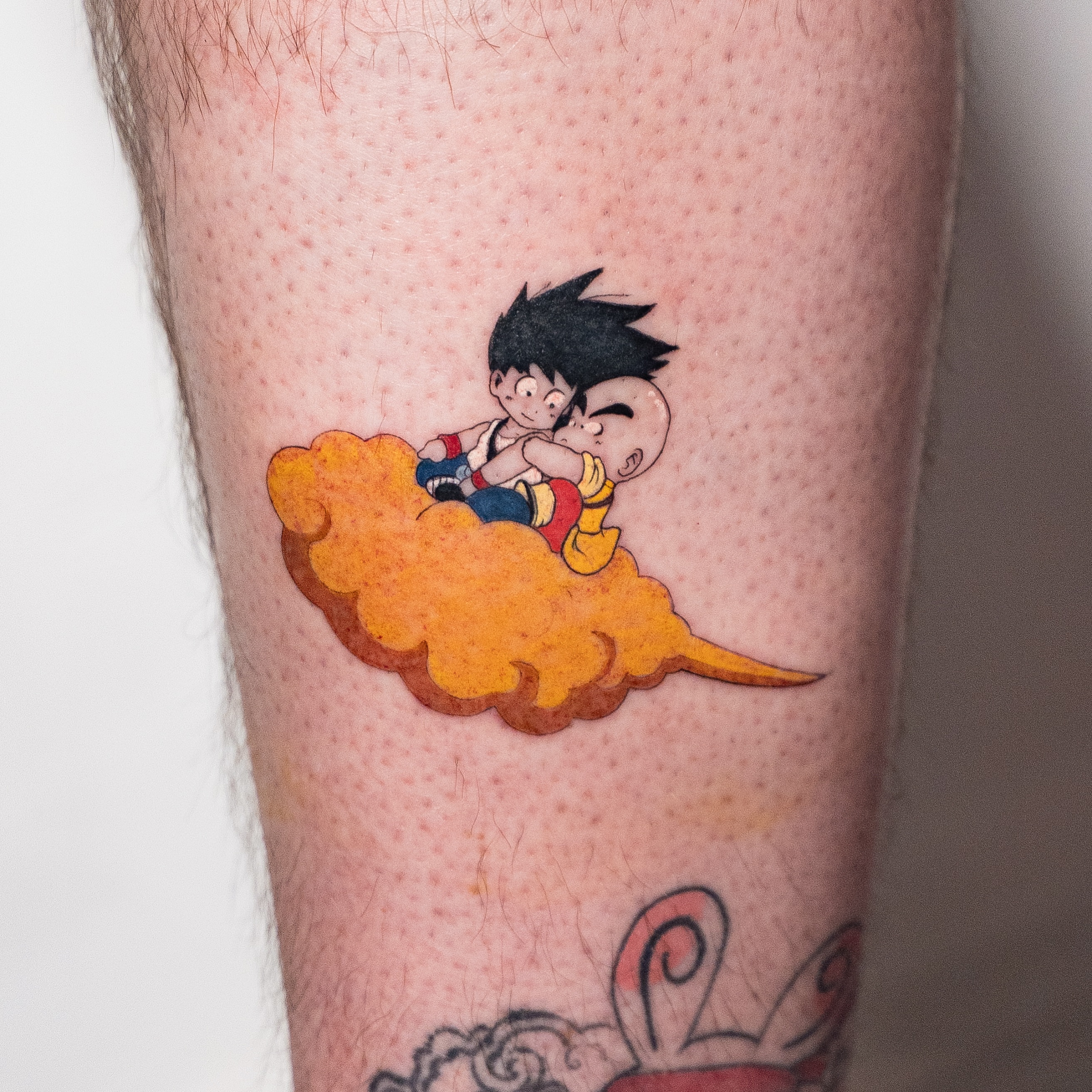 Son goku flying anime tattoo on the forearm by Kalin, Seattle, Washington