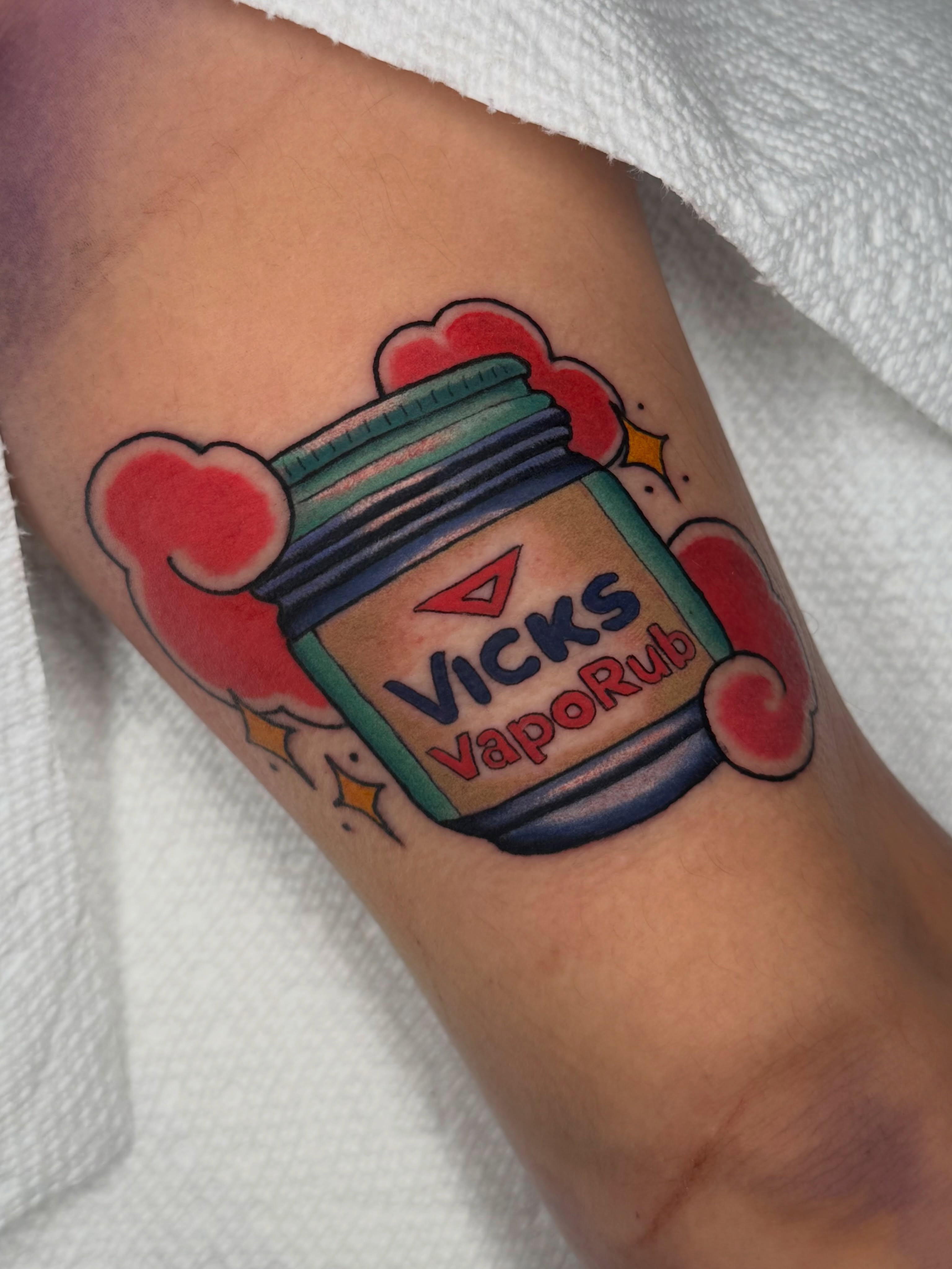 Vicks VapoRub jar American traditional tattoo on the forearm by Kyle Kuhn