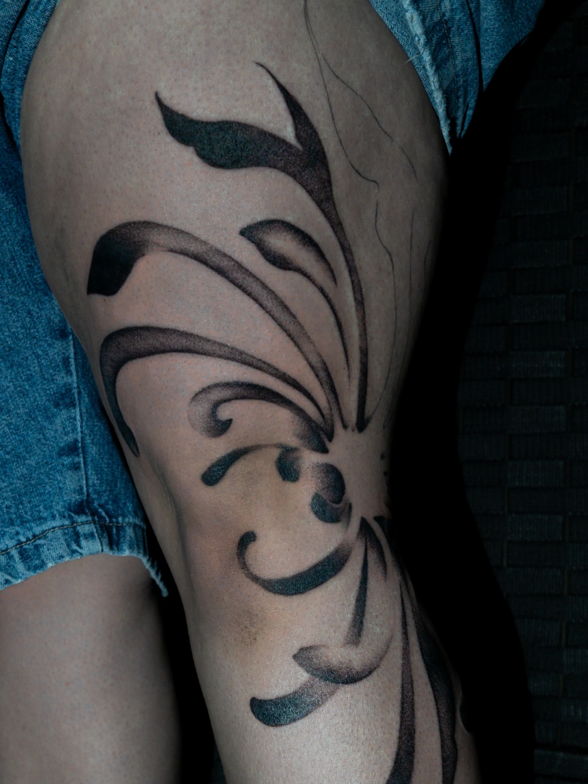 Swirls black and grey tattoo on the forearm by Boise Tattoo Artist