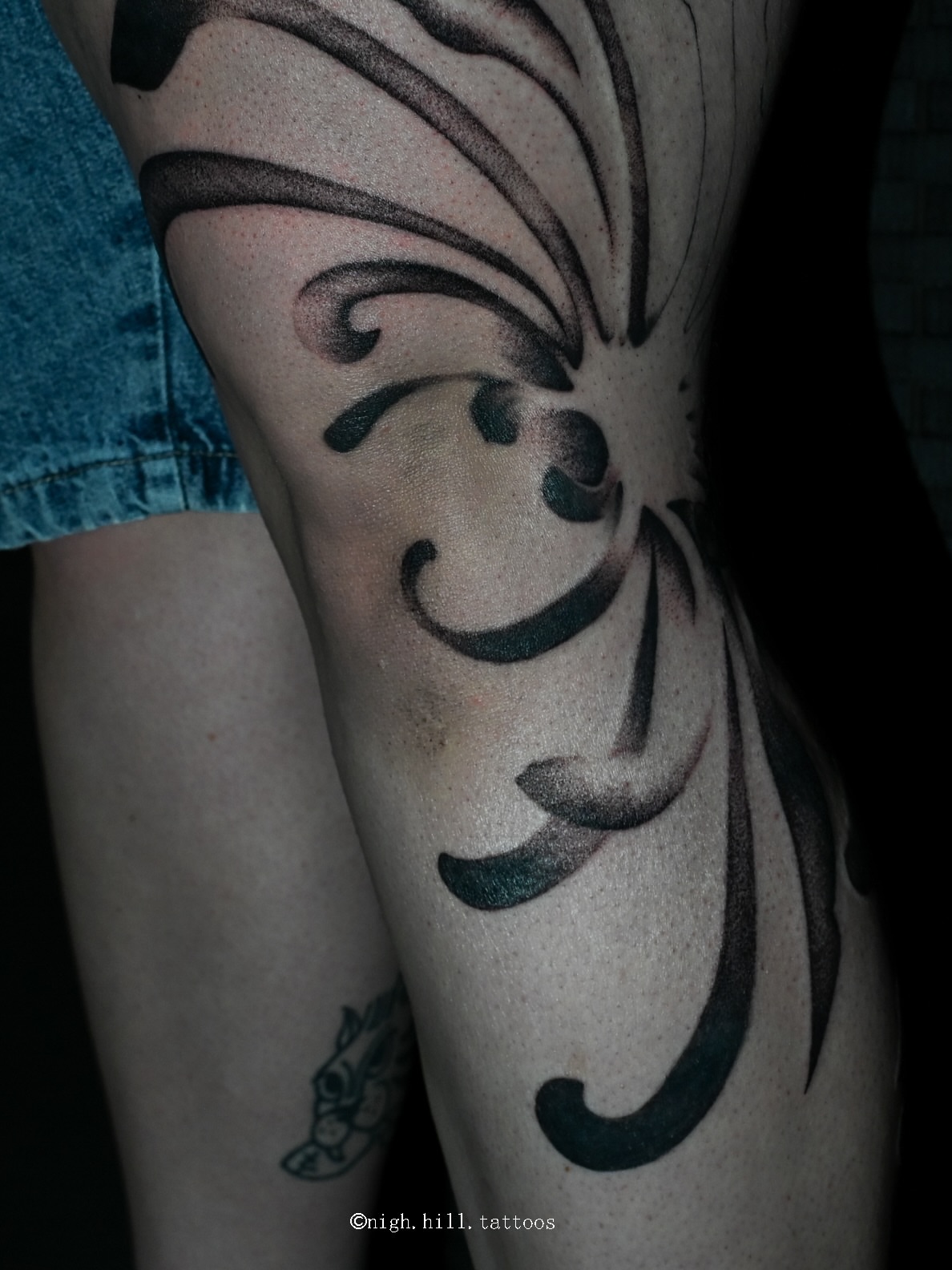 Abstract swirl tribal tattoo on the forearm by Boise Tattoo Artist