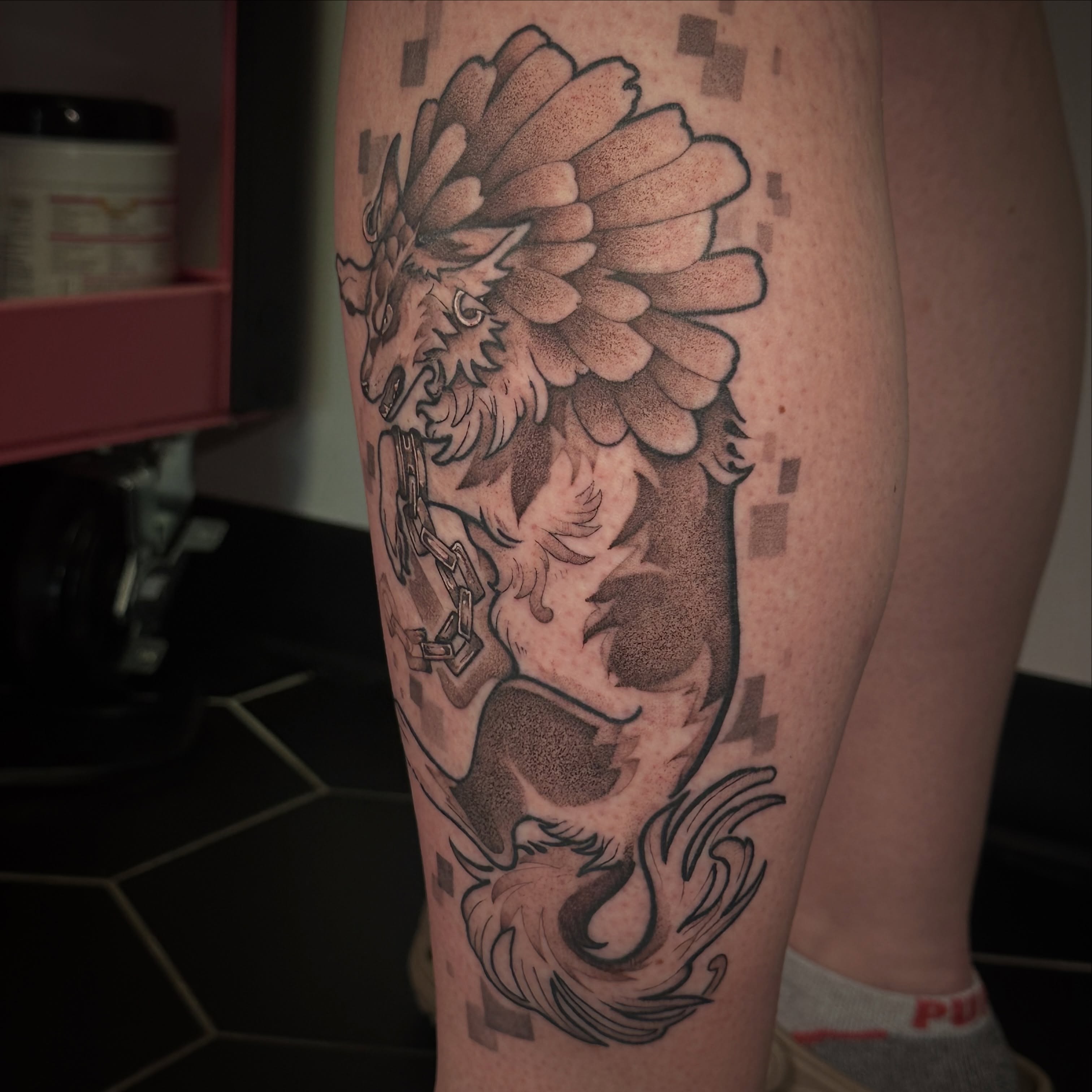 Chained dragon dotwork tattoo on the thigh by TATTOOLIZARD (James)