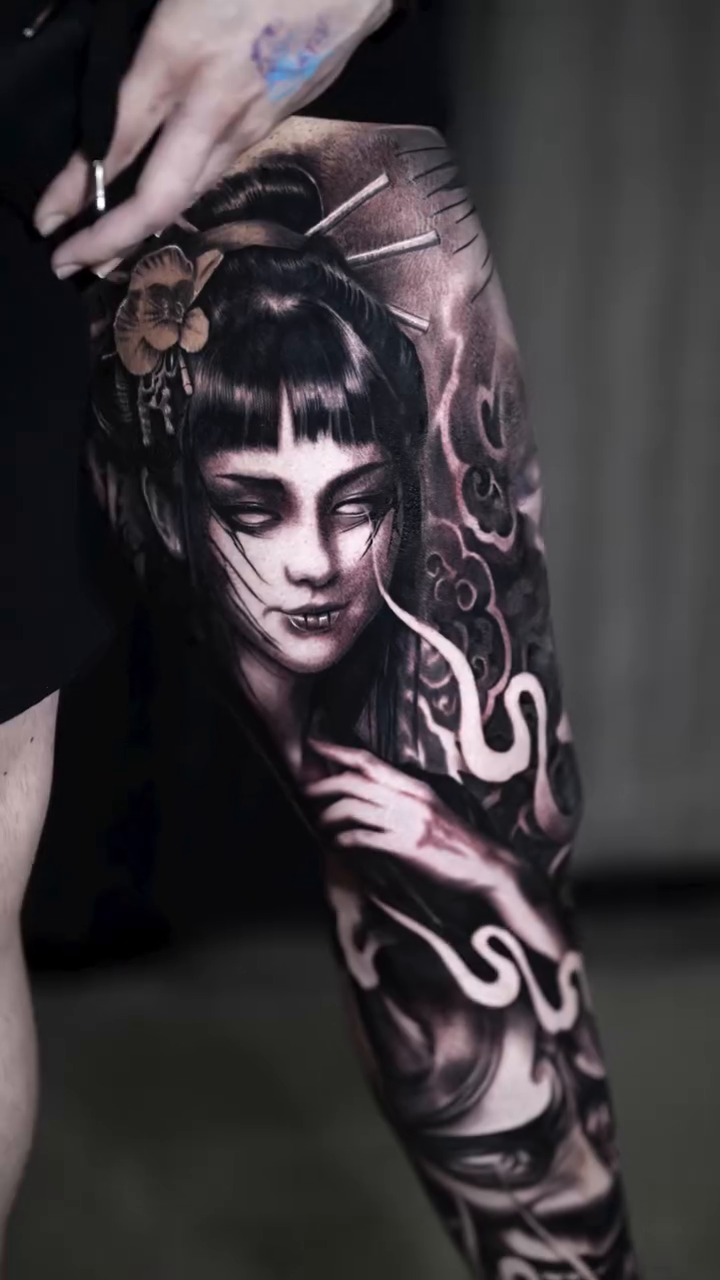 Woman with snakes realism tattoo by Michael Sosa