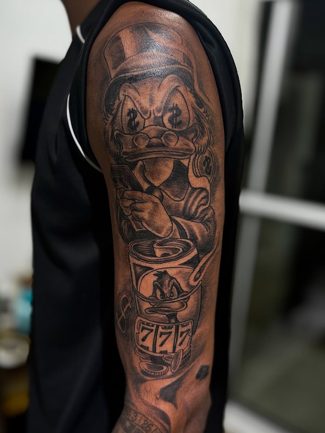 Scrooge McDuck with slot machine realism tattoo on the forearm by Mauricio gois