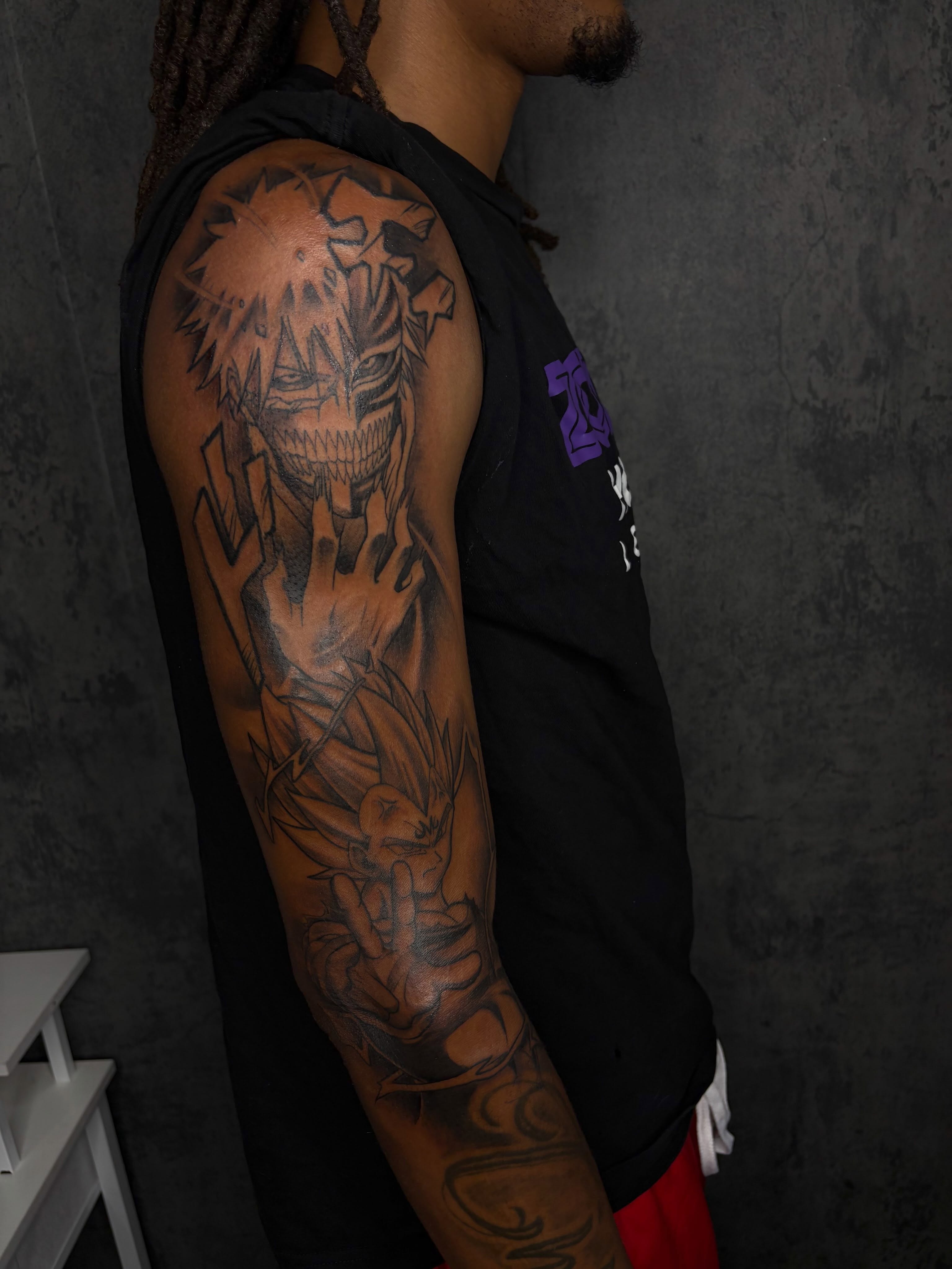 Anime character anime tattoo on the upper arm by ✧ Dallas Tattoo Artist  ✧