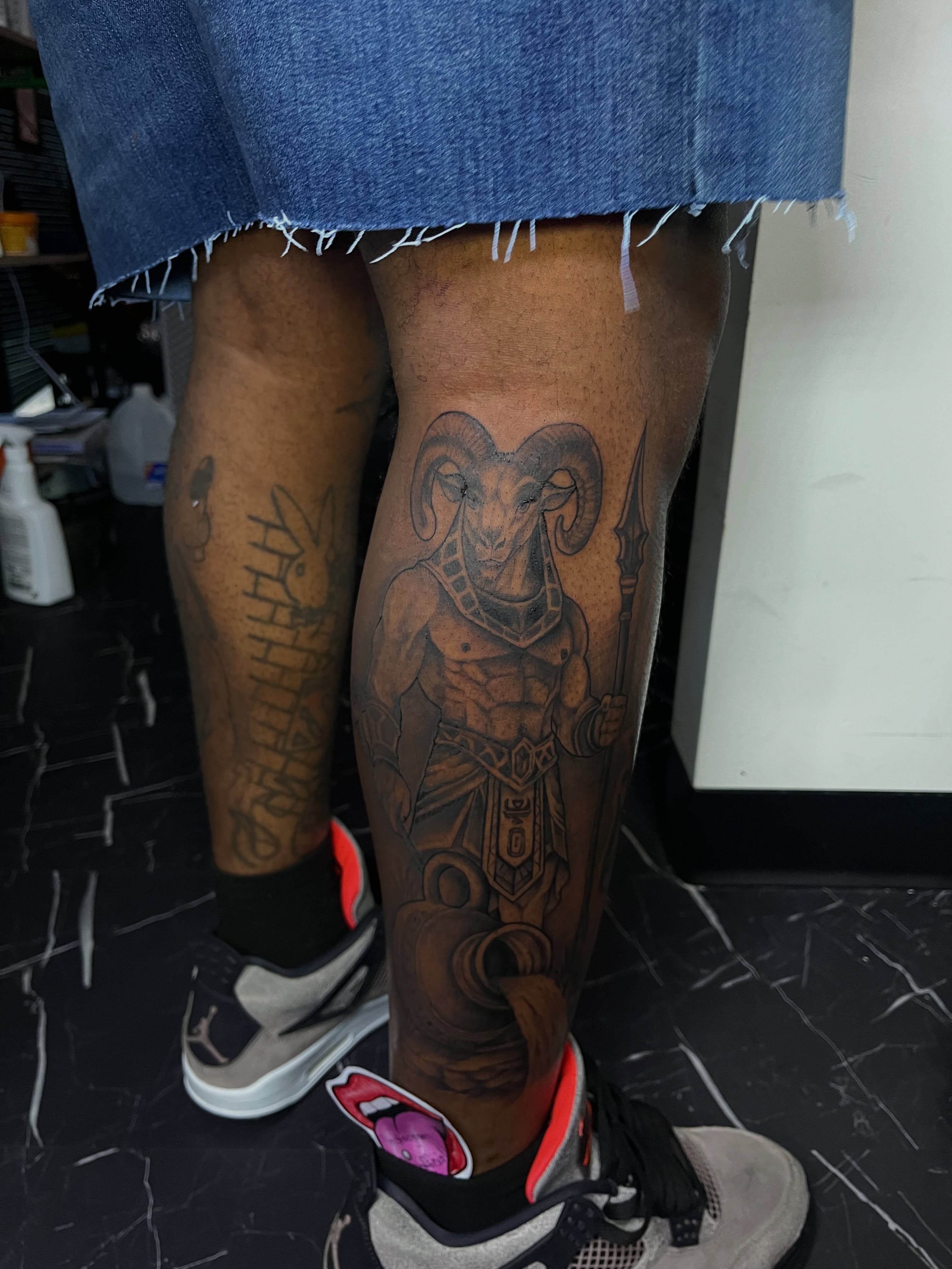 Ram-headed warrior realism tattoo on the leg by Doll The Tattoo Artist, Addison, Texas