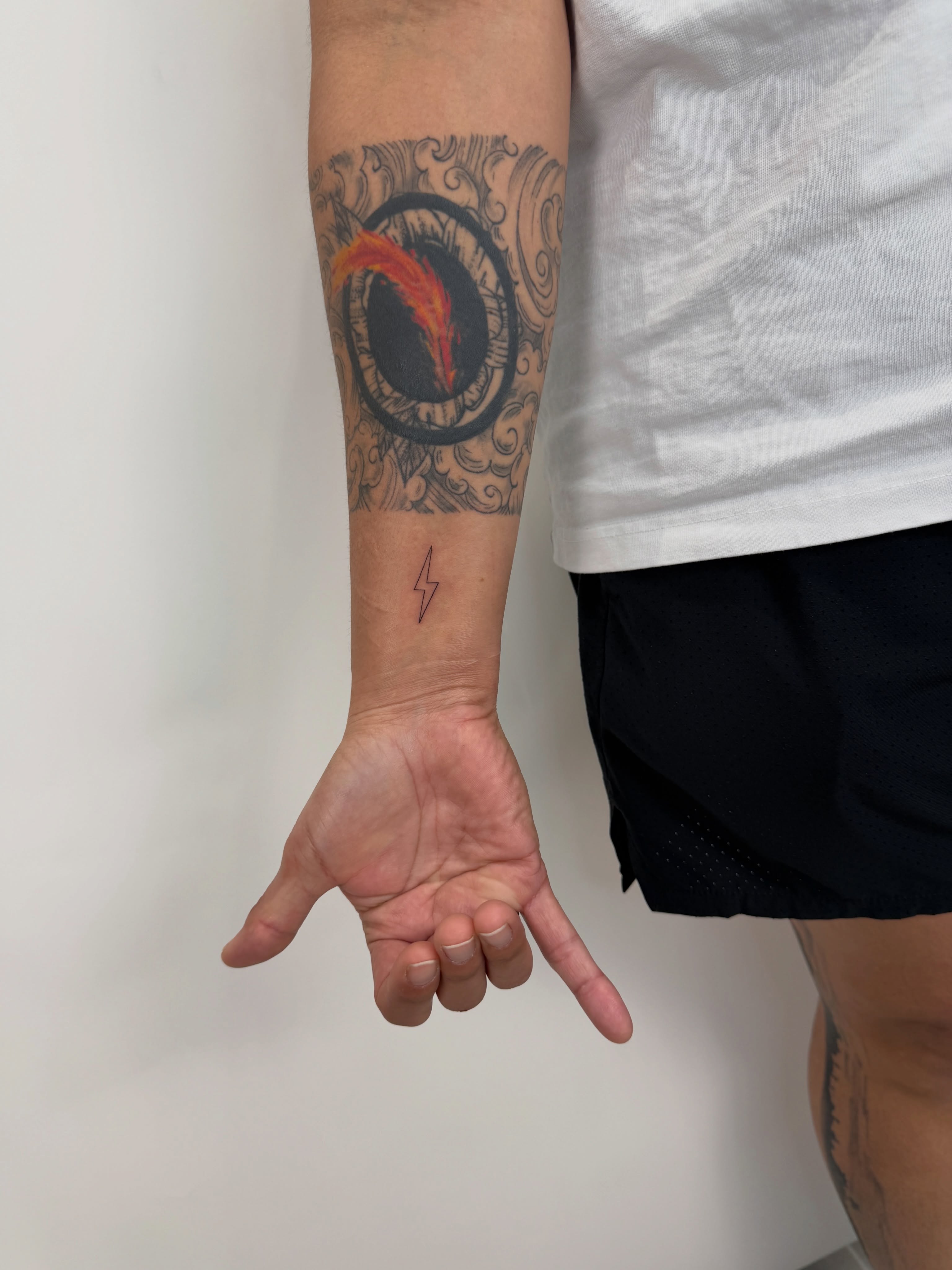 Eye with flame neo-traditional tattoo on the forearm by Alex