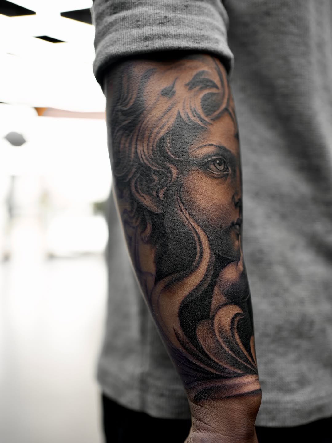 Tattoo by @dcvern_ink — realism, black_and_grey