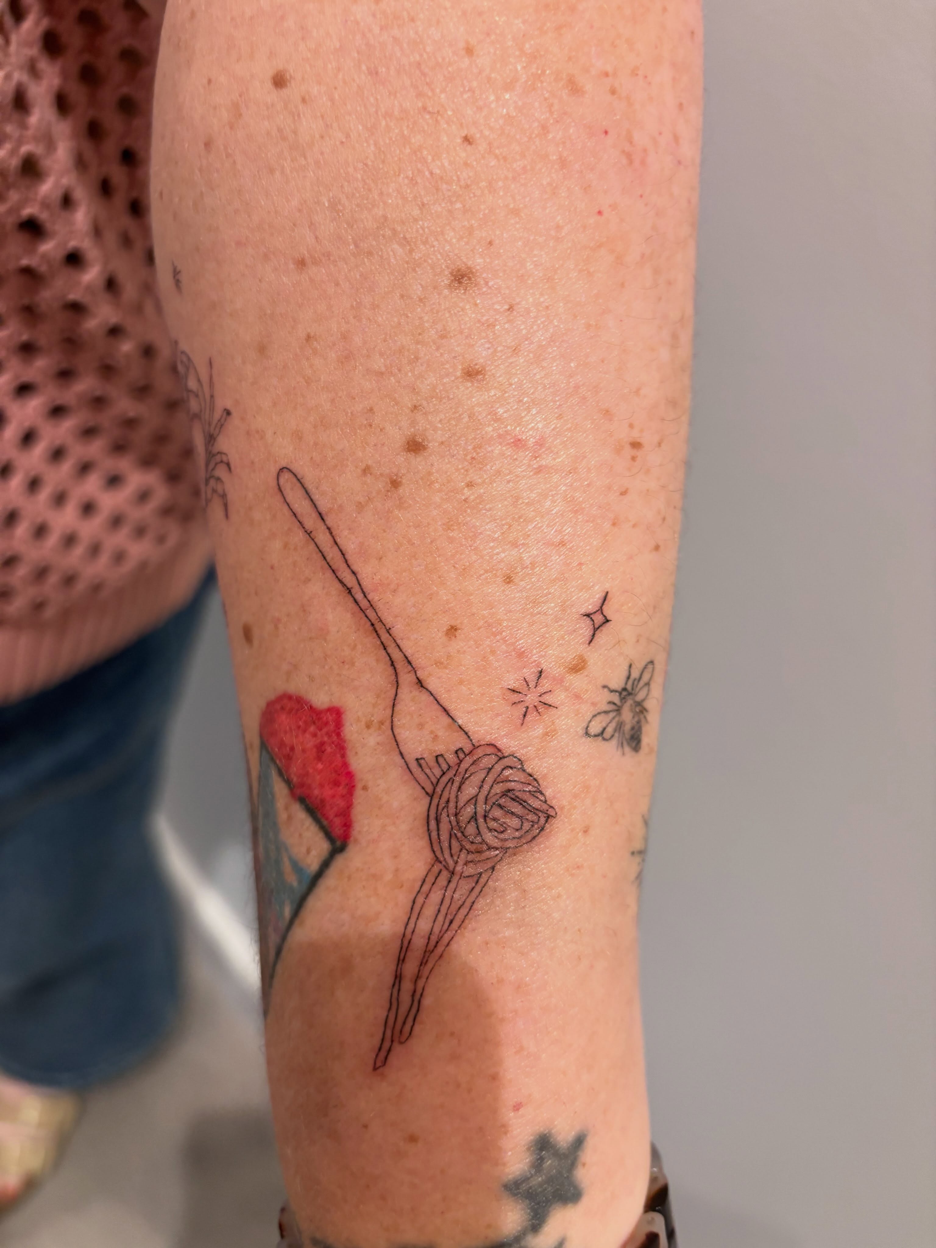 Crochet hook fine line tattoo on the forearm by Malissa