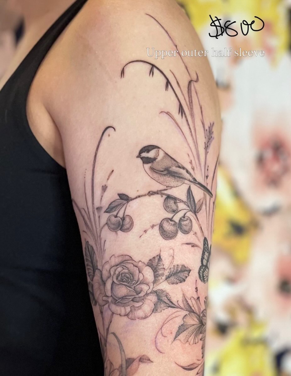 Bird and cherry blossoms realism tattoo on the forearm by paige  l  ink shrink tattoo