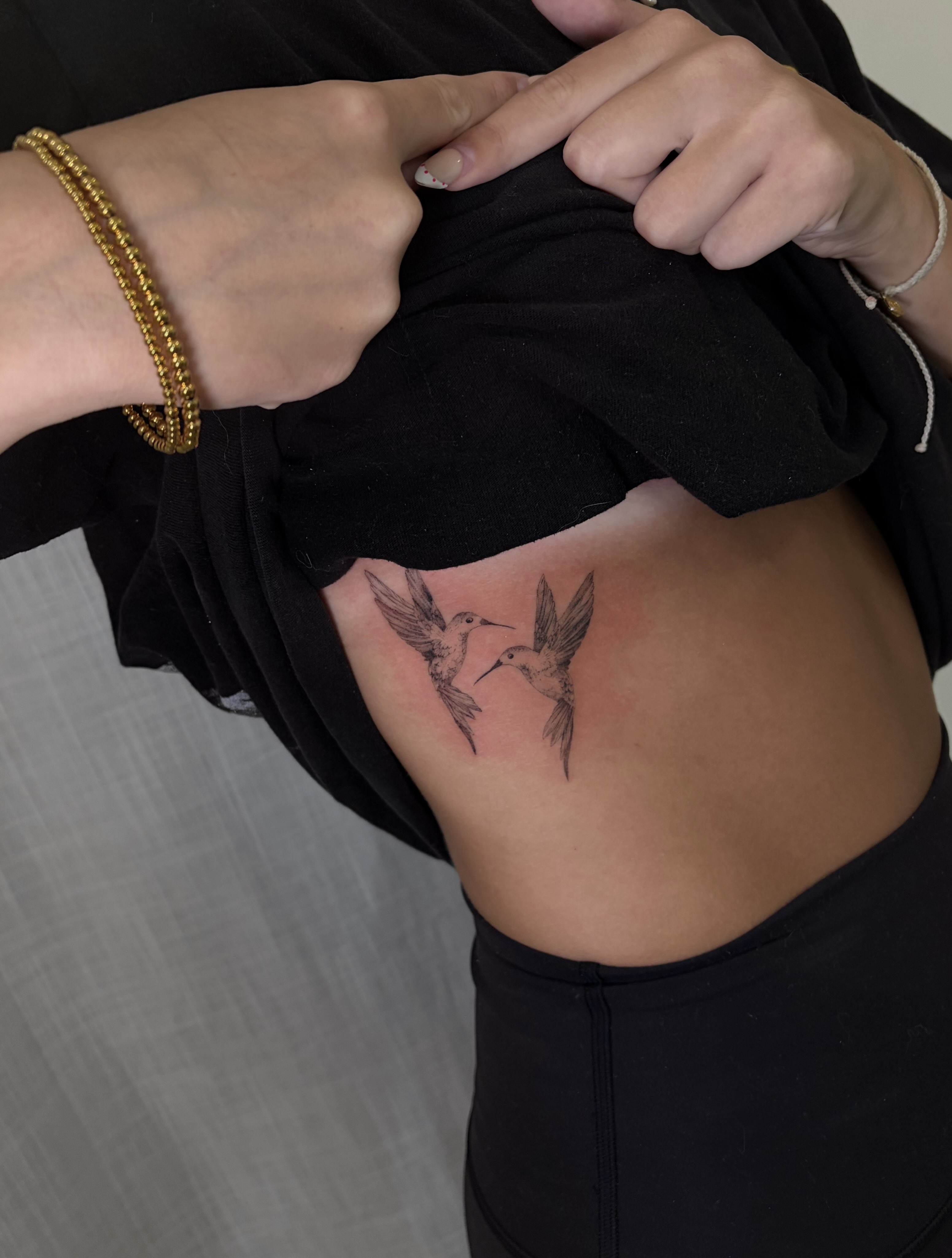 Hummingbirds black and grey tattoo on the ribs by Justene Renee 🖤 Fine Line Tattoo Artist