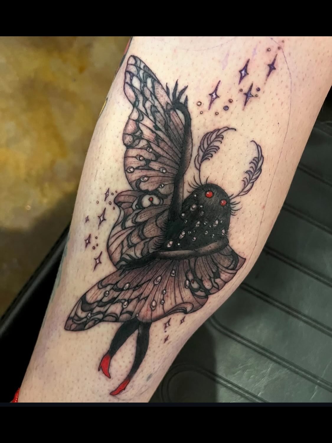 Moth dotwork tattoo on the forearm by Nathan Esteras