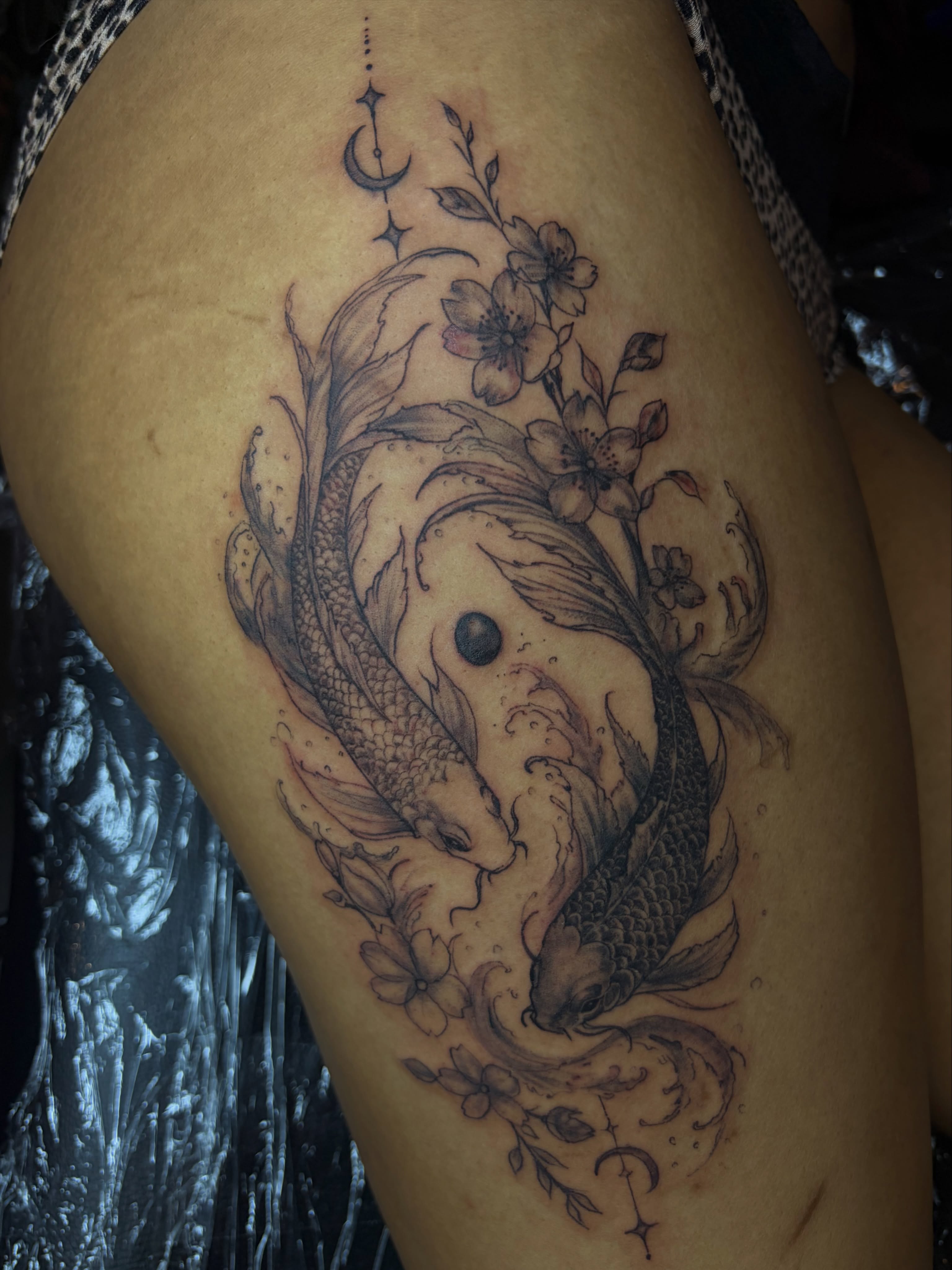 Koi fish and flowers realism tattoo on the thigh by Inked By E, Philadelphia, Pennsylvania