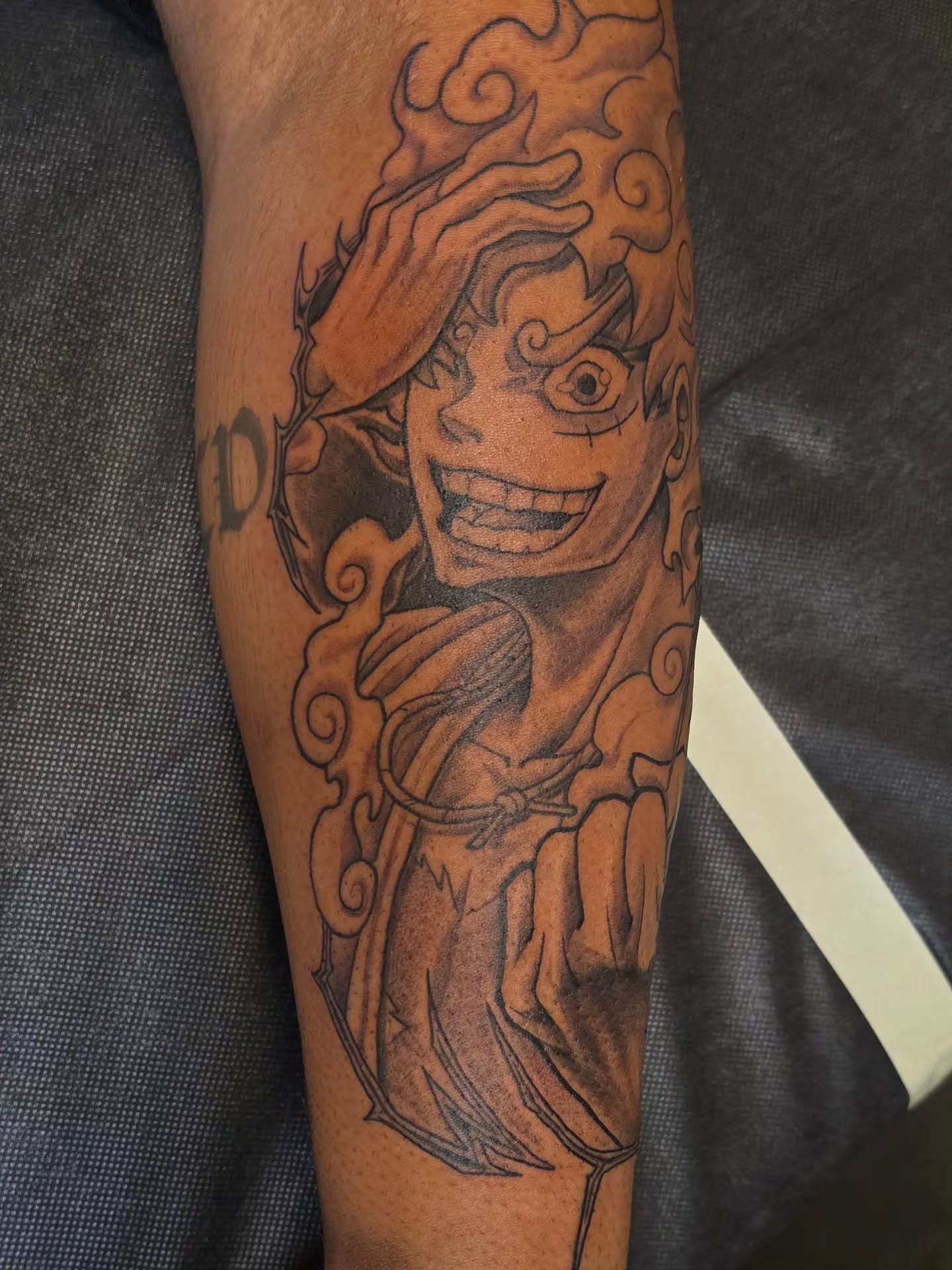 One piece character anime tattoo on the forearm by Anthony Moncada