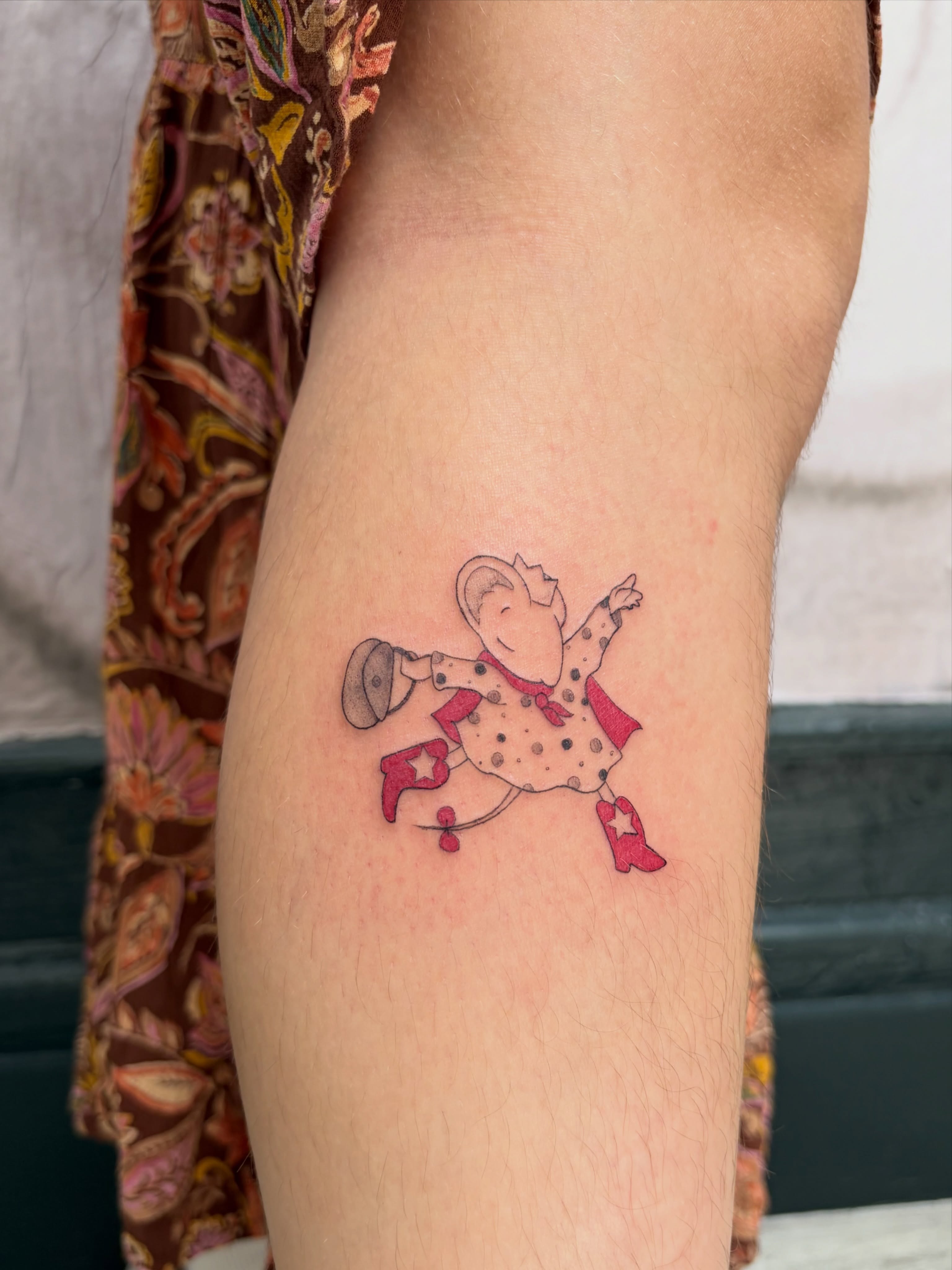 Circus performer dotwork tattoo on the forearm by Kyra Monterrosa
