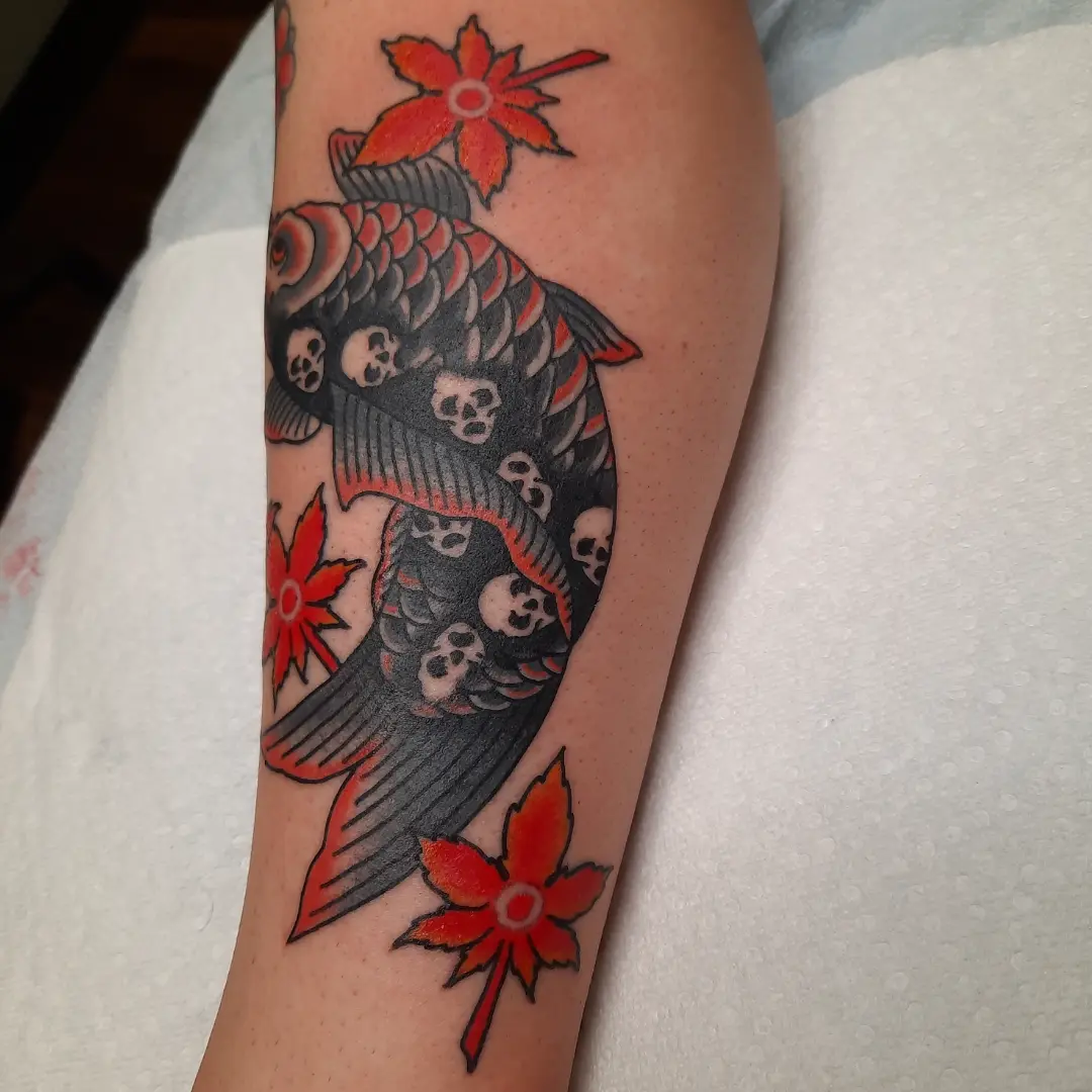 Koi fish with skulls American traditional tattoo on the forearm by Kaetlyn