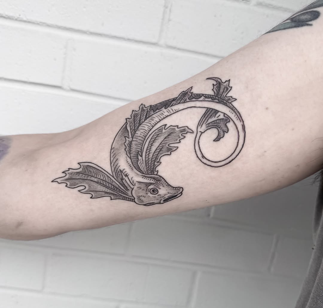 Fish black and grey tattoo on the forearm by Audrey Kacel, Holland, Michigan