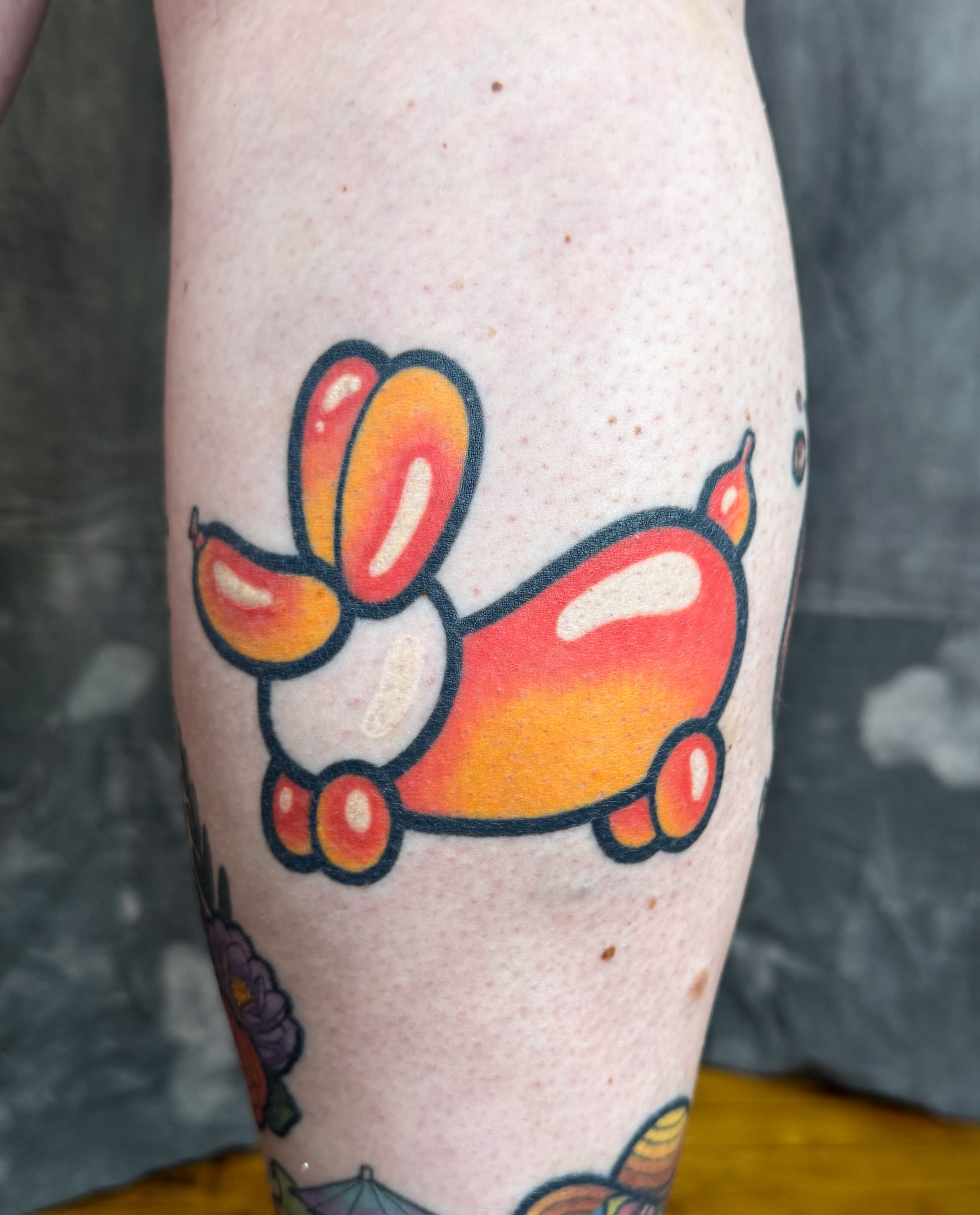 Balloon animal dotwork tattoo on the forearm by Janine Ramos