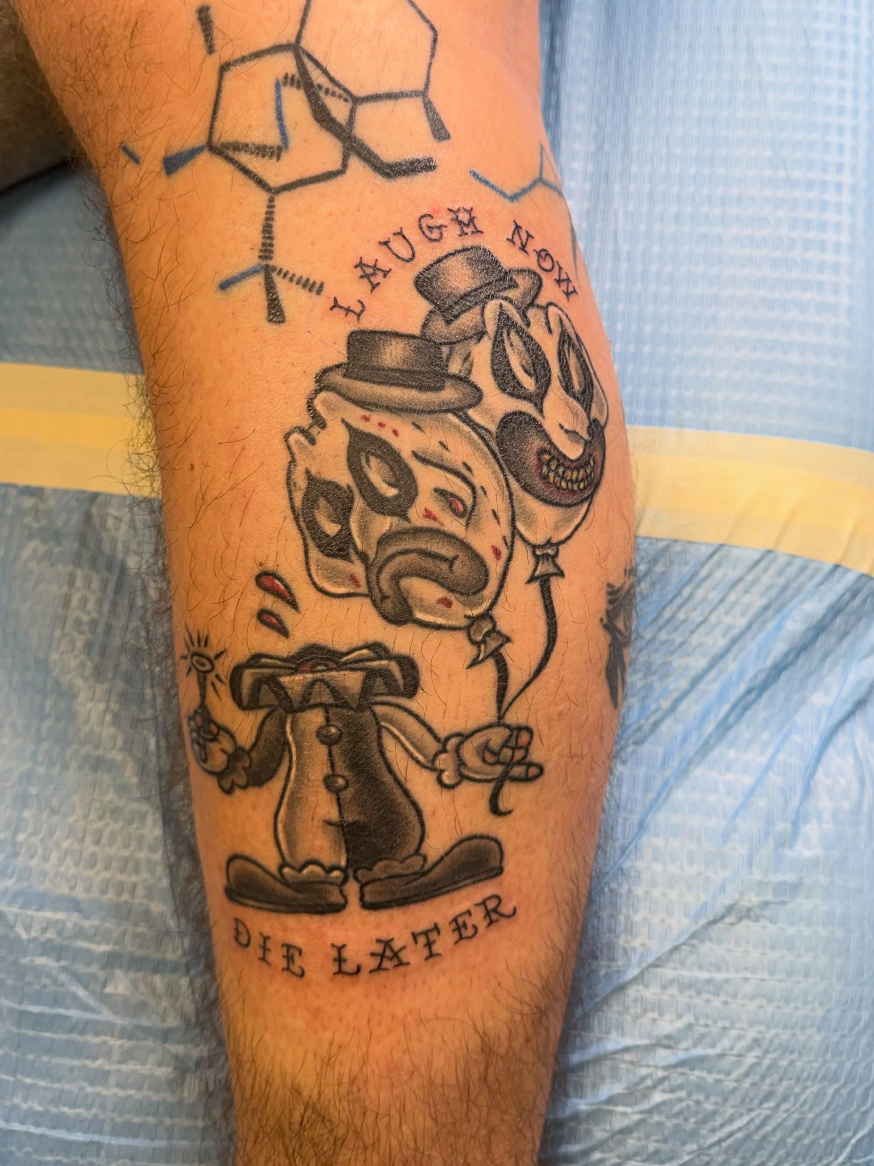 Joker and clown black and grey tattoo on the forearm by linda perez