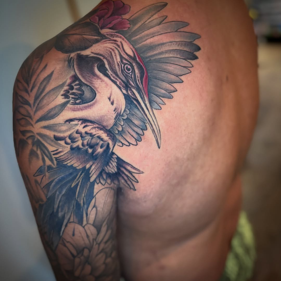 Heron realism tattoo on the shoulder by Matthew Crawley