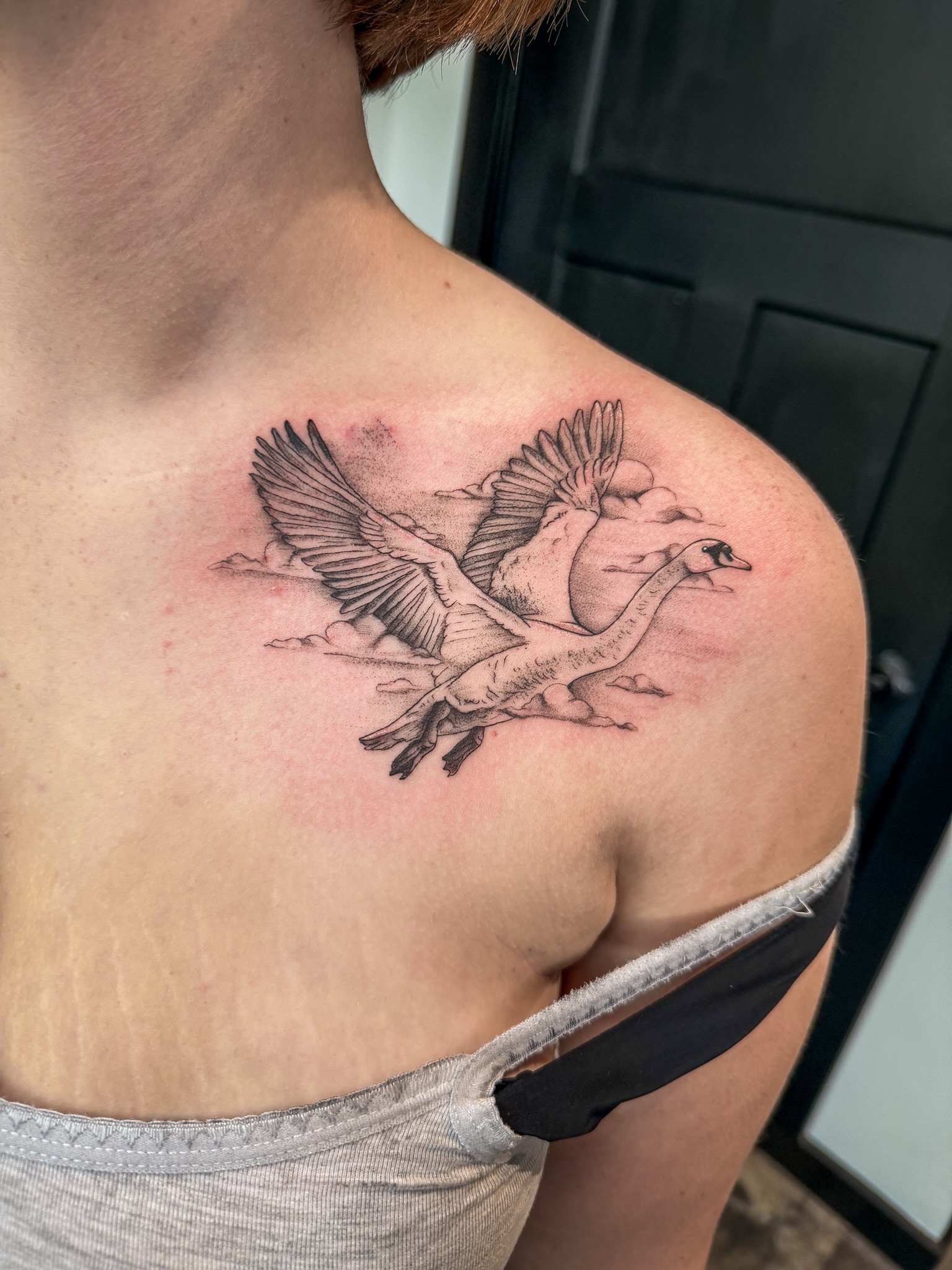 Ducks flying black and grey tattoo on the shoulder by Reagan Sutton