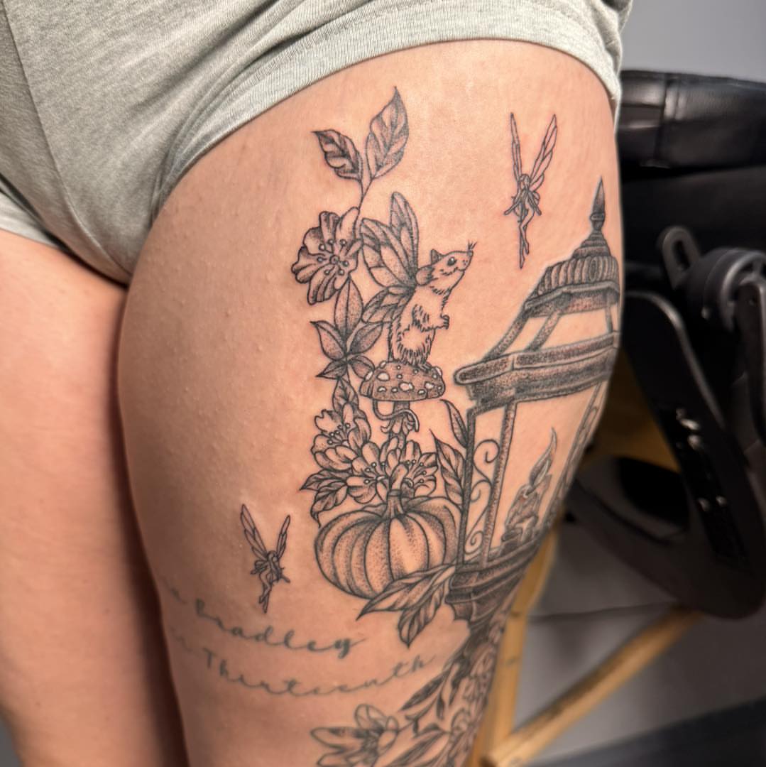 Faerie garden realism tattoo on the thigh by Destiny A