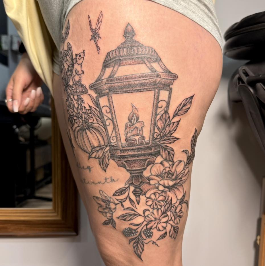 Lantern with candle dotwork tattoo on the thigh by Destiny A