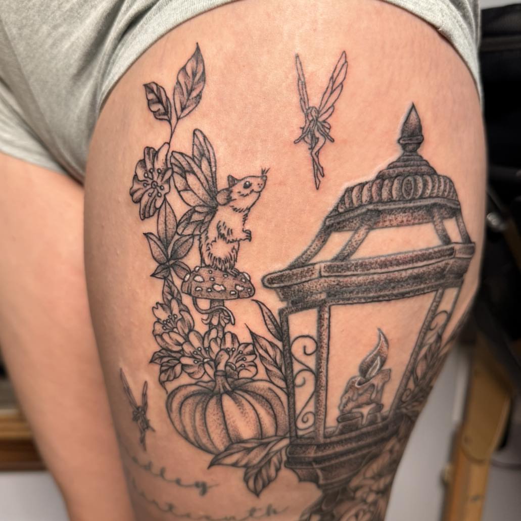 Fairy lantern black and grey tattoo on the thigh by Destiny A