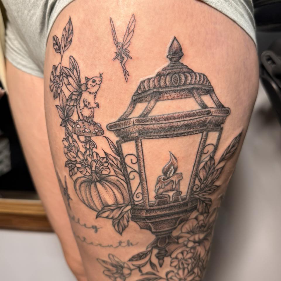 Lantern with candle dotwork tattoo on the thigh by Destiny A
