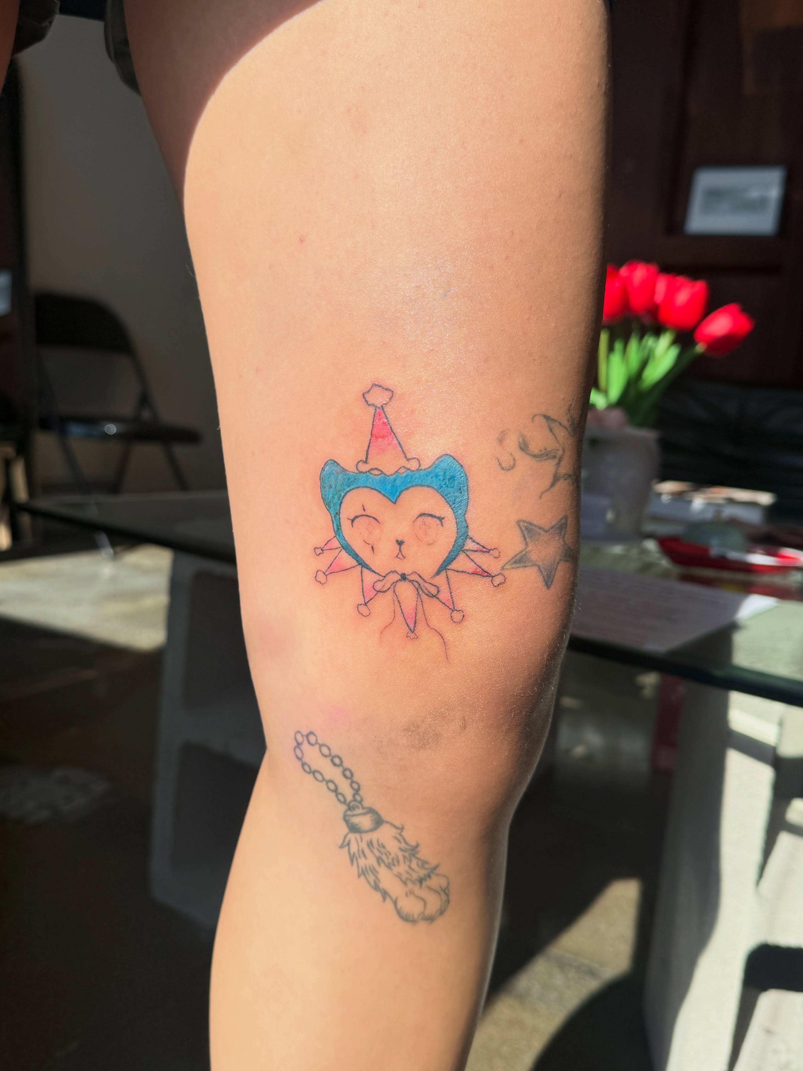 Cat with party hat watercolor tattoo on the forearm by nova ♡ˎˊ˗ tattoo apprentice