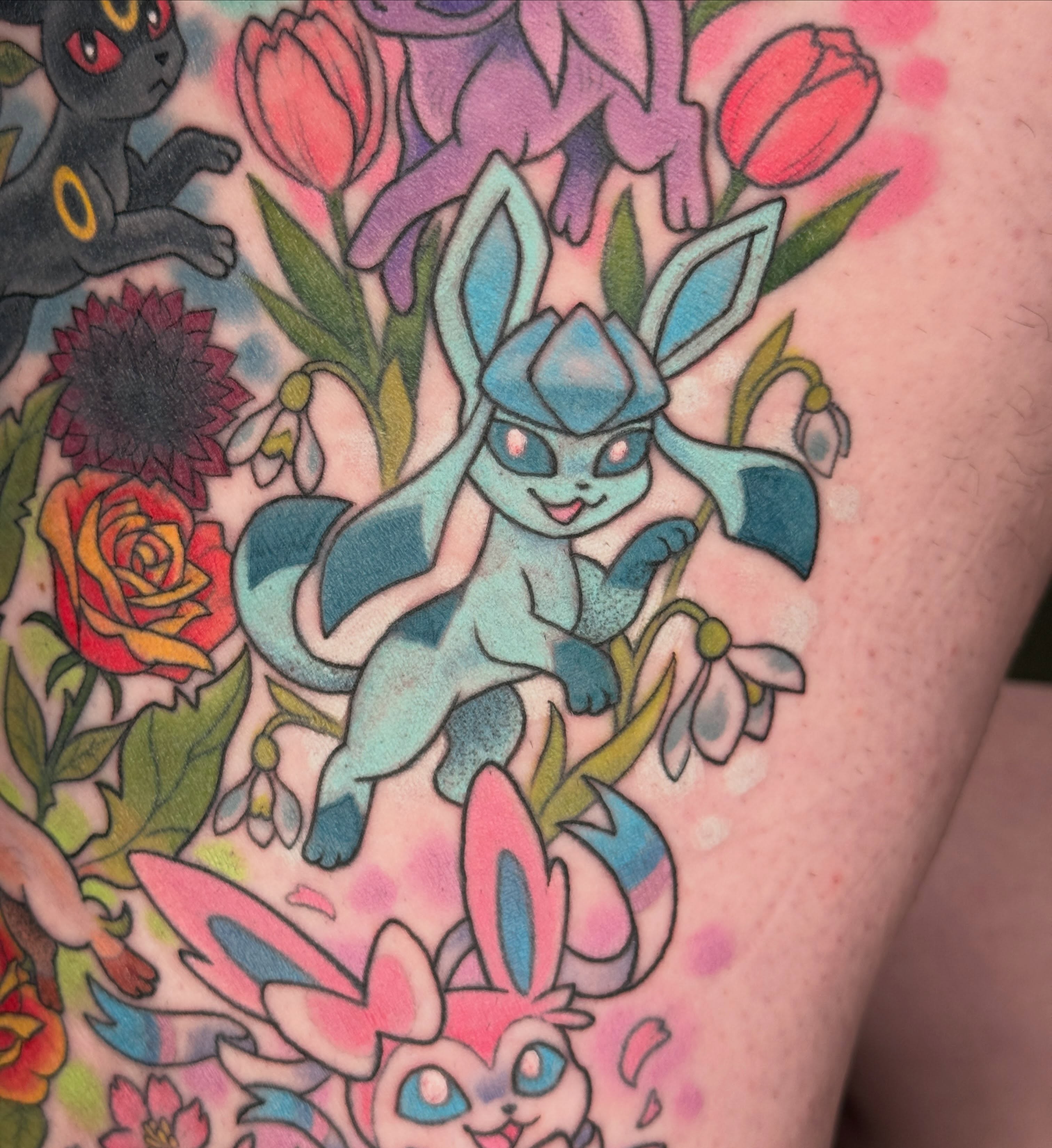 Sliggoo and tulips dotwork tattoo on the upper arm by liam u. williams