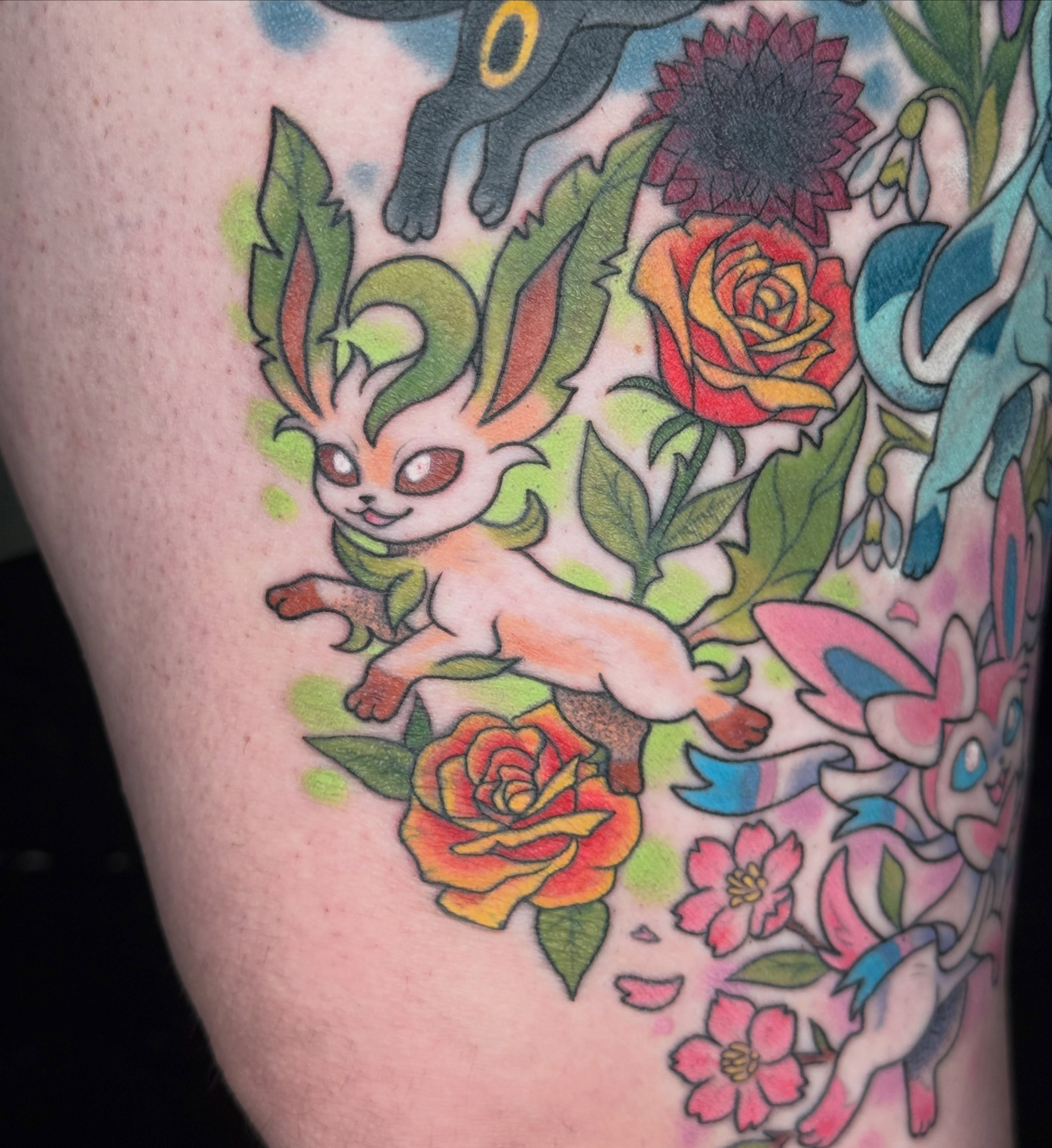 Jolteon and roses new school tattoo on the thigh by liam u. williams