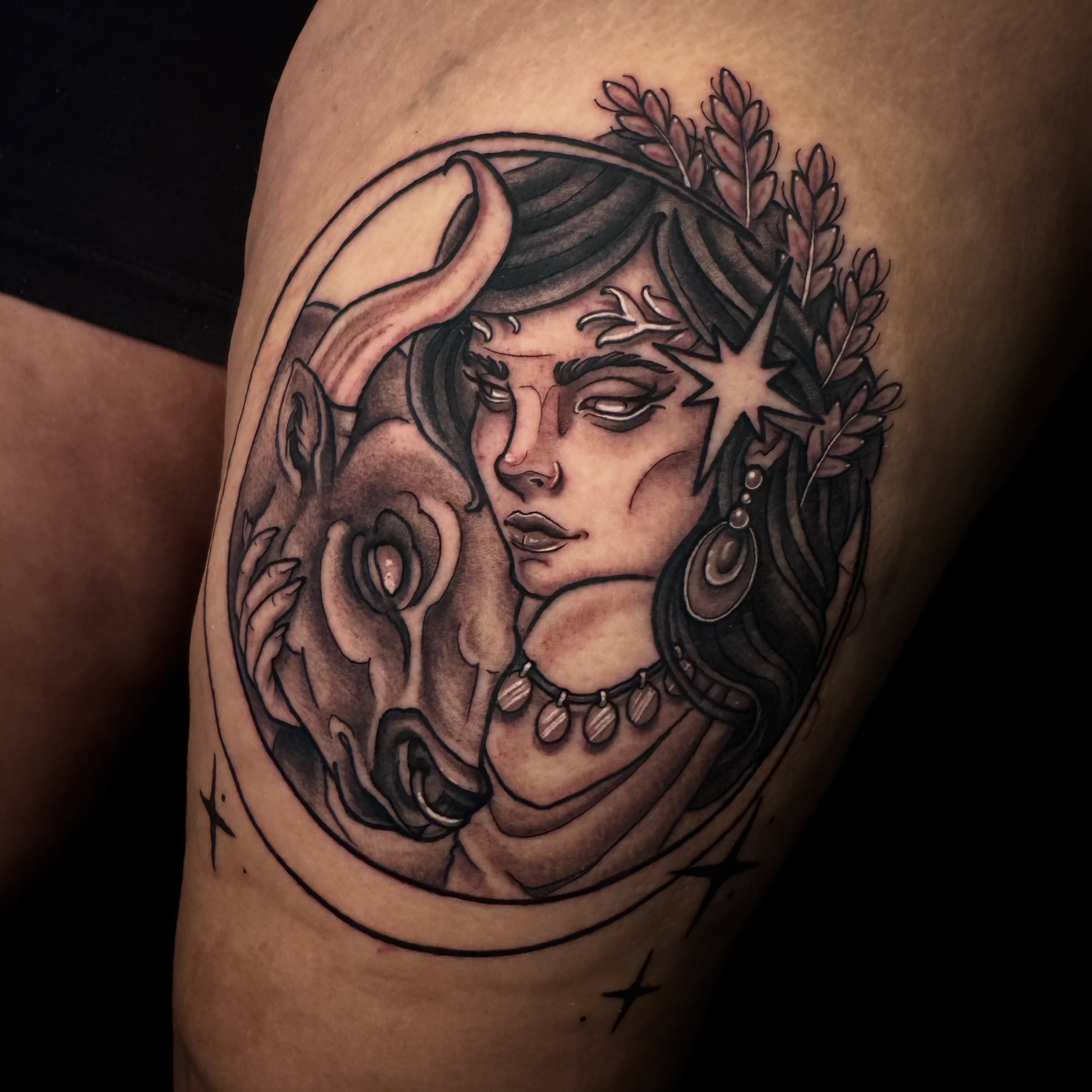 Woman with bull realism tattoo on the thigh by Dee Florian