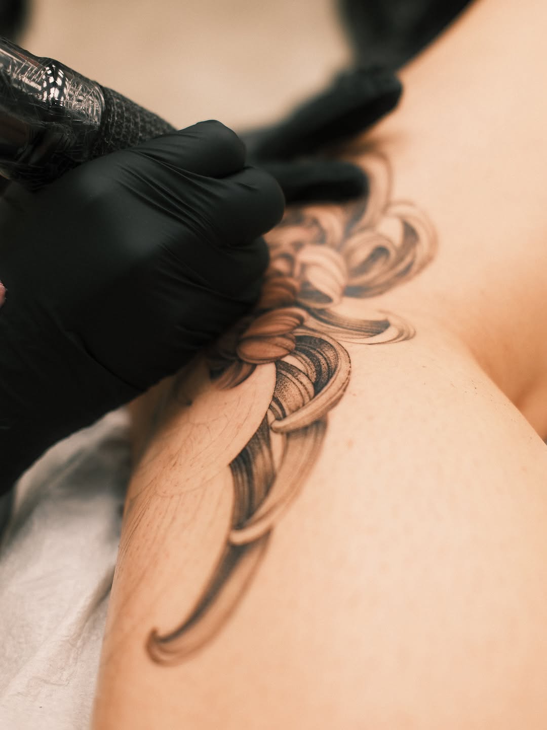 Ornamental floral design tribal tattoo on the shoulder by Valentina