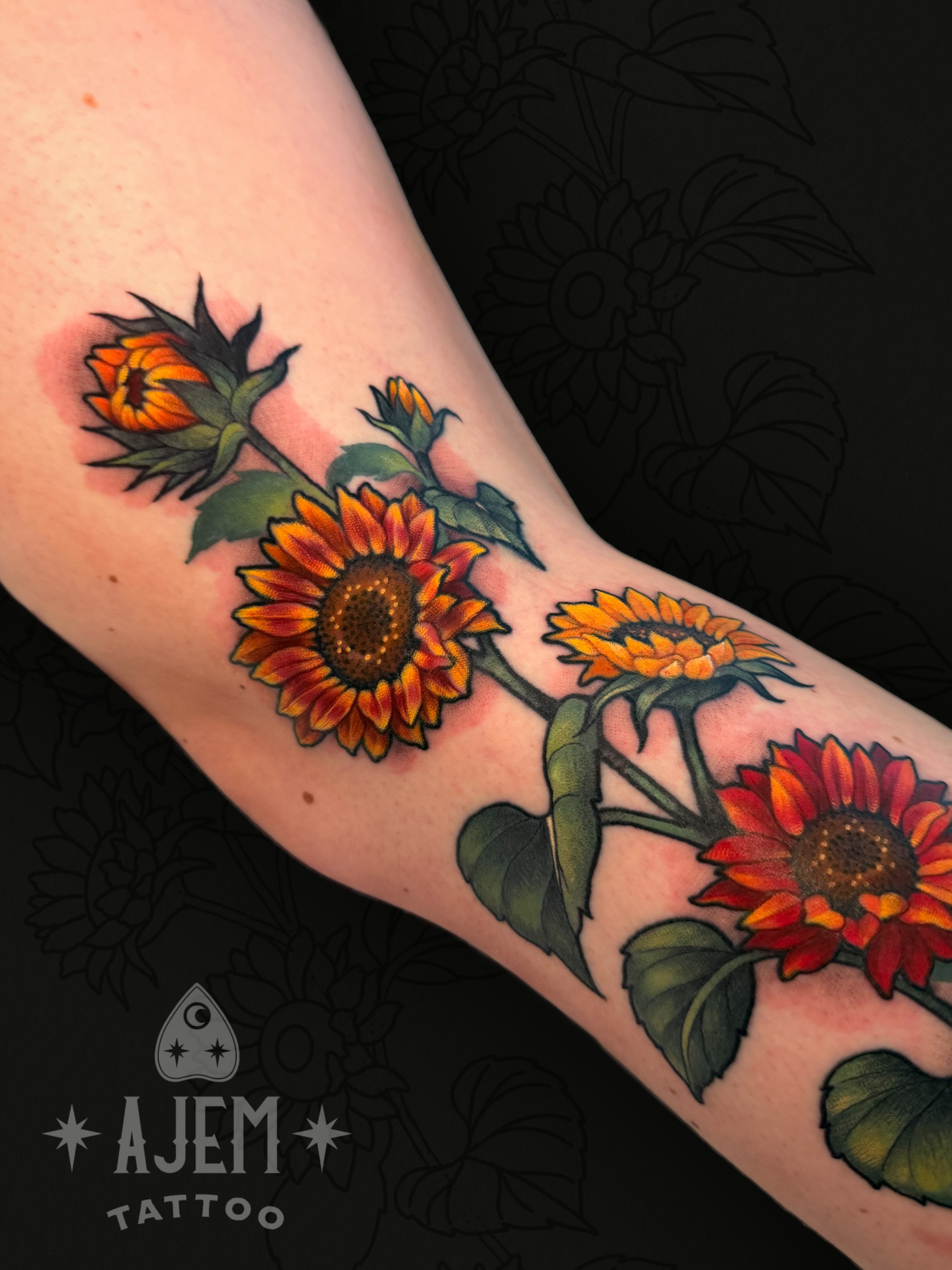 Sunflowers realism tattoo on the forearm by Ash MacIsaac