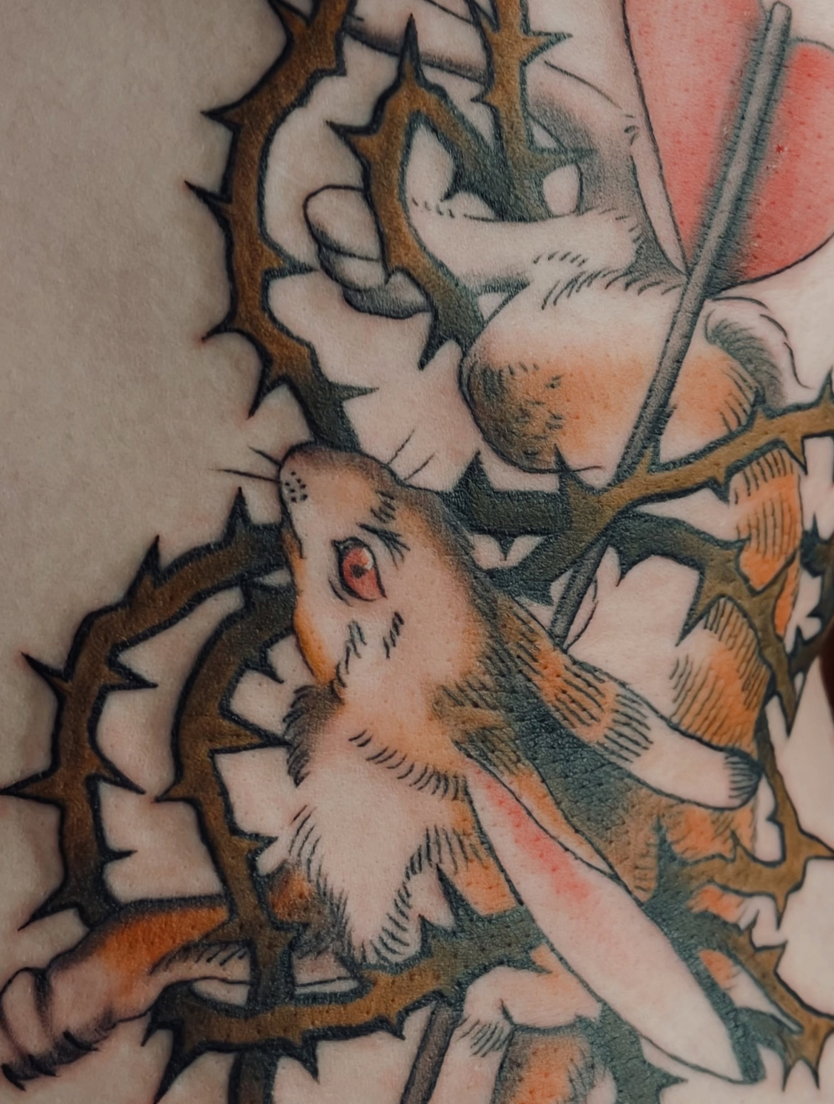 Rabbit and thorns American traditional tattoo by Zoe Phan, Richmond, Virginia
