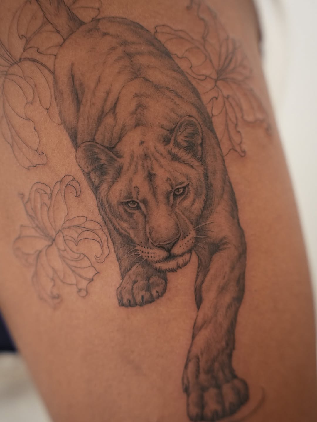 Tattoo by @junh_tattoo — realism, black_and_grey