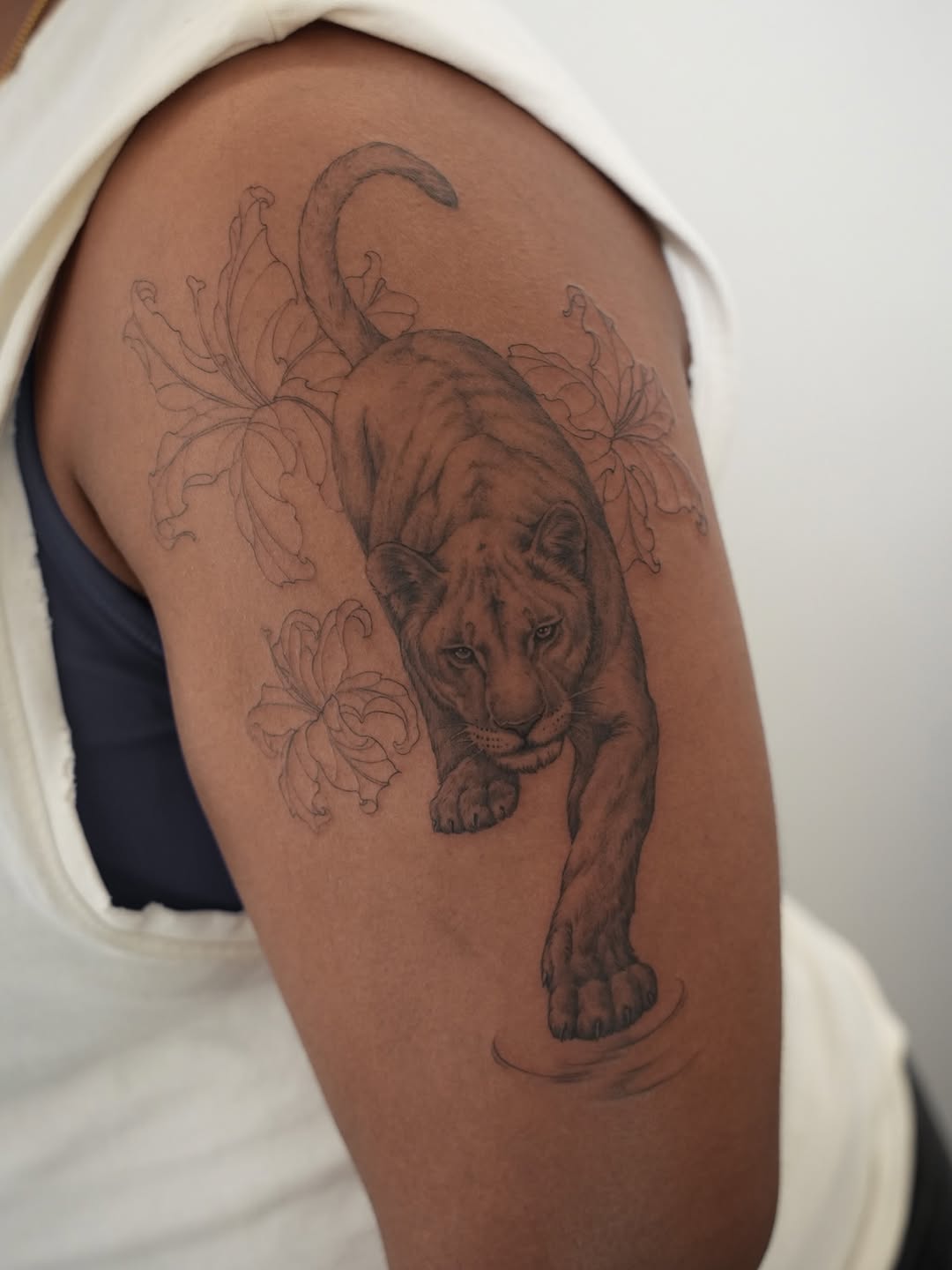 Tattoo by @junh_tattoo — realism, black_and_grey